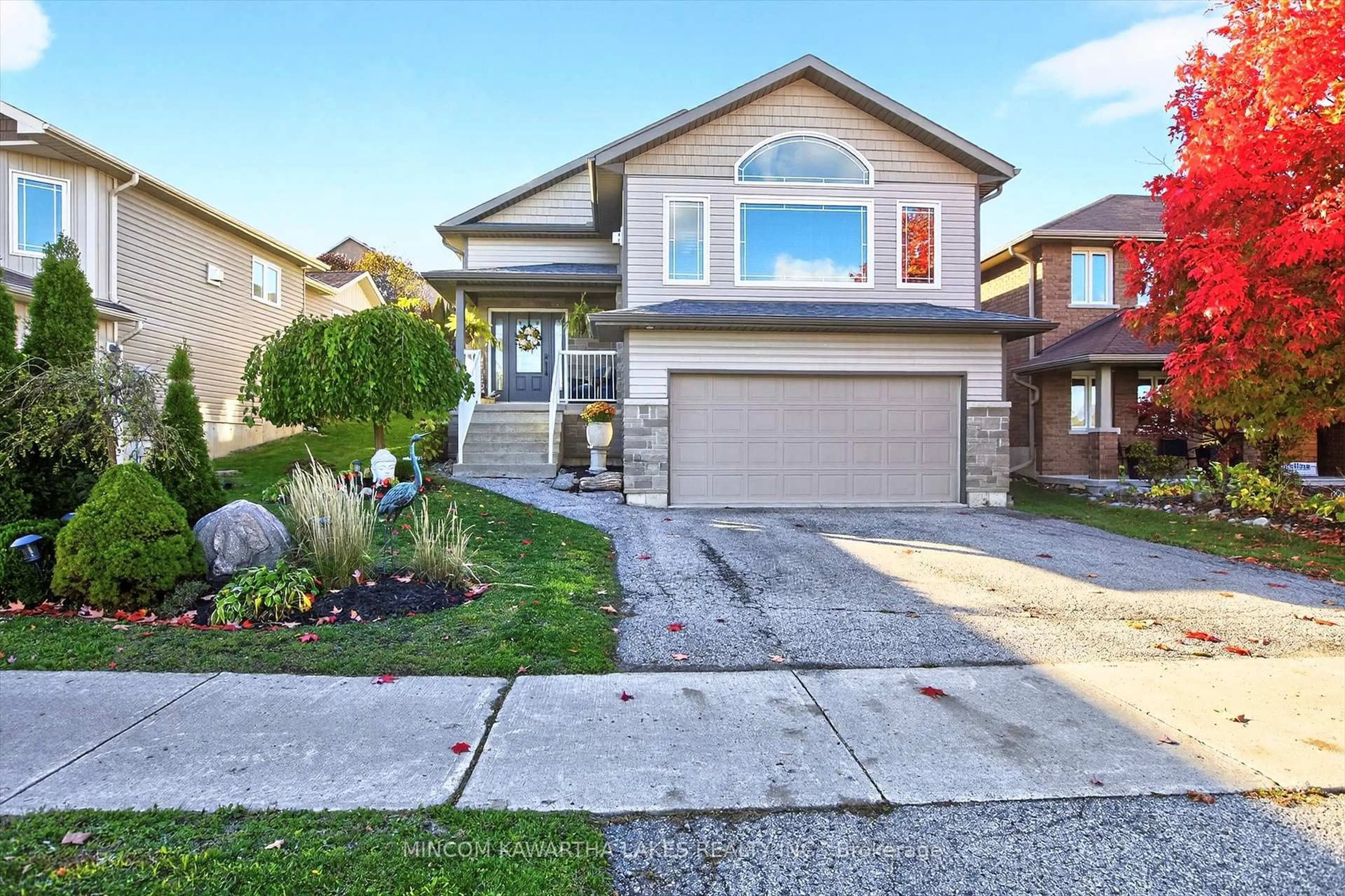 Home with vinyl exterior material, street for 127 Milroy Dr, Peterborough Ontario K9H 7T3