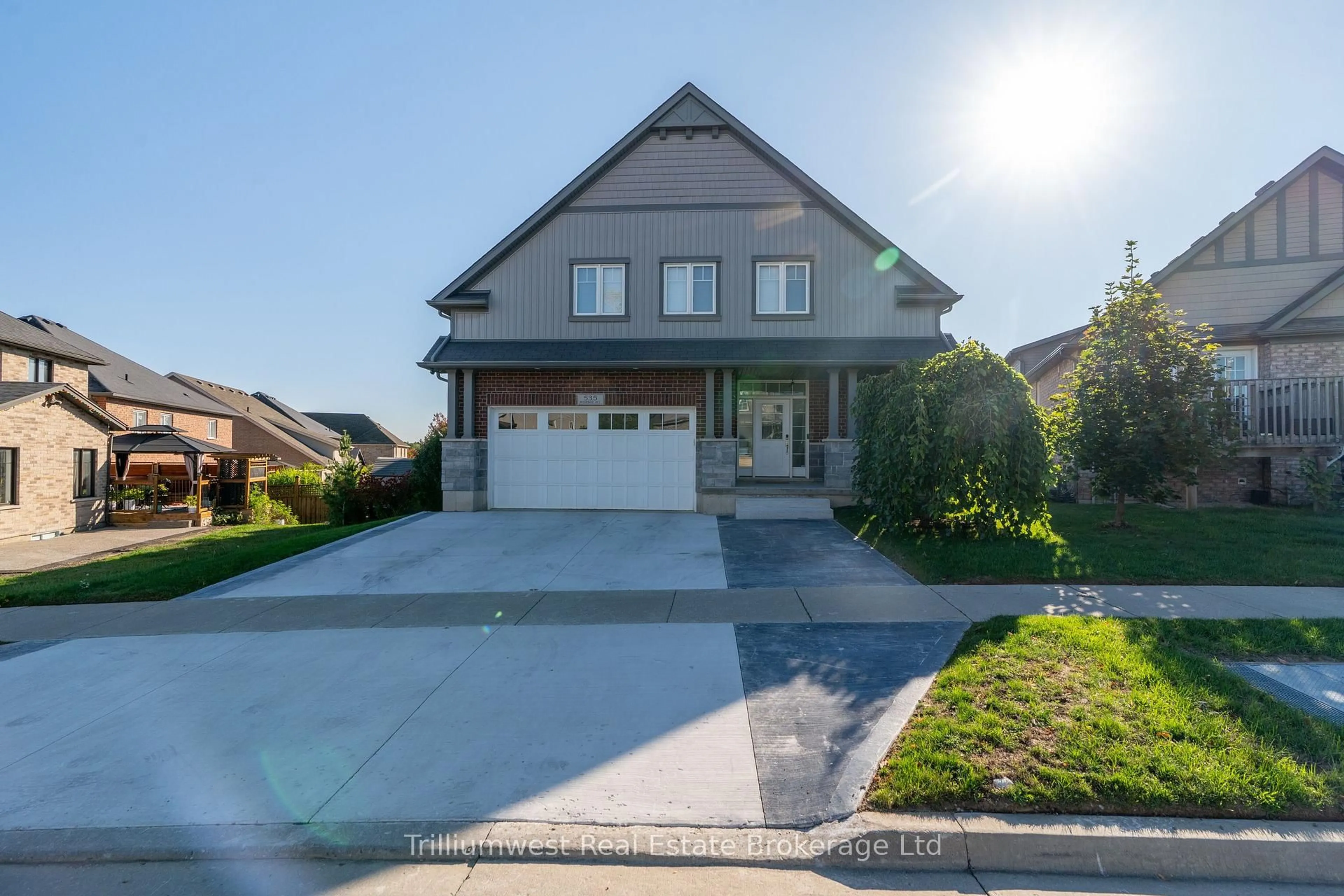 Home with brick exterior material, street for 535 Woodbine Ave, Kitchener Ontario N2R 1Y9
