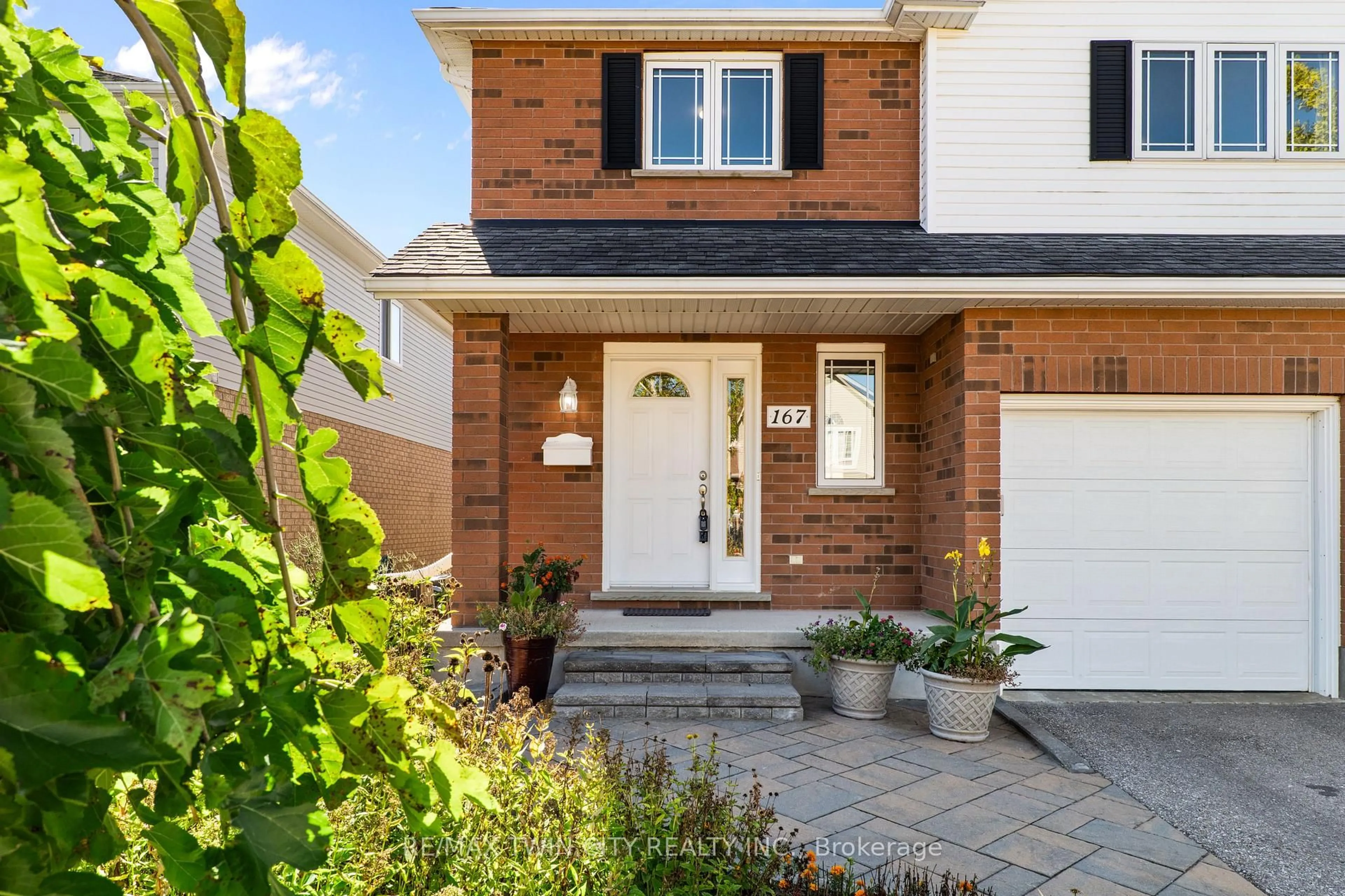 Home with brick exterior material, street for 167 Bridgewater Cres, Waterloo Ontario N2T 2M1