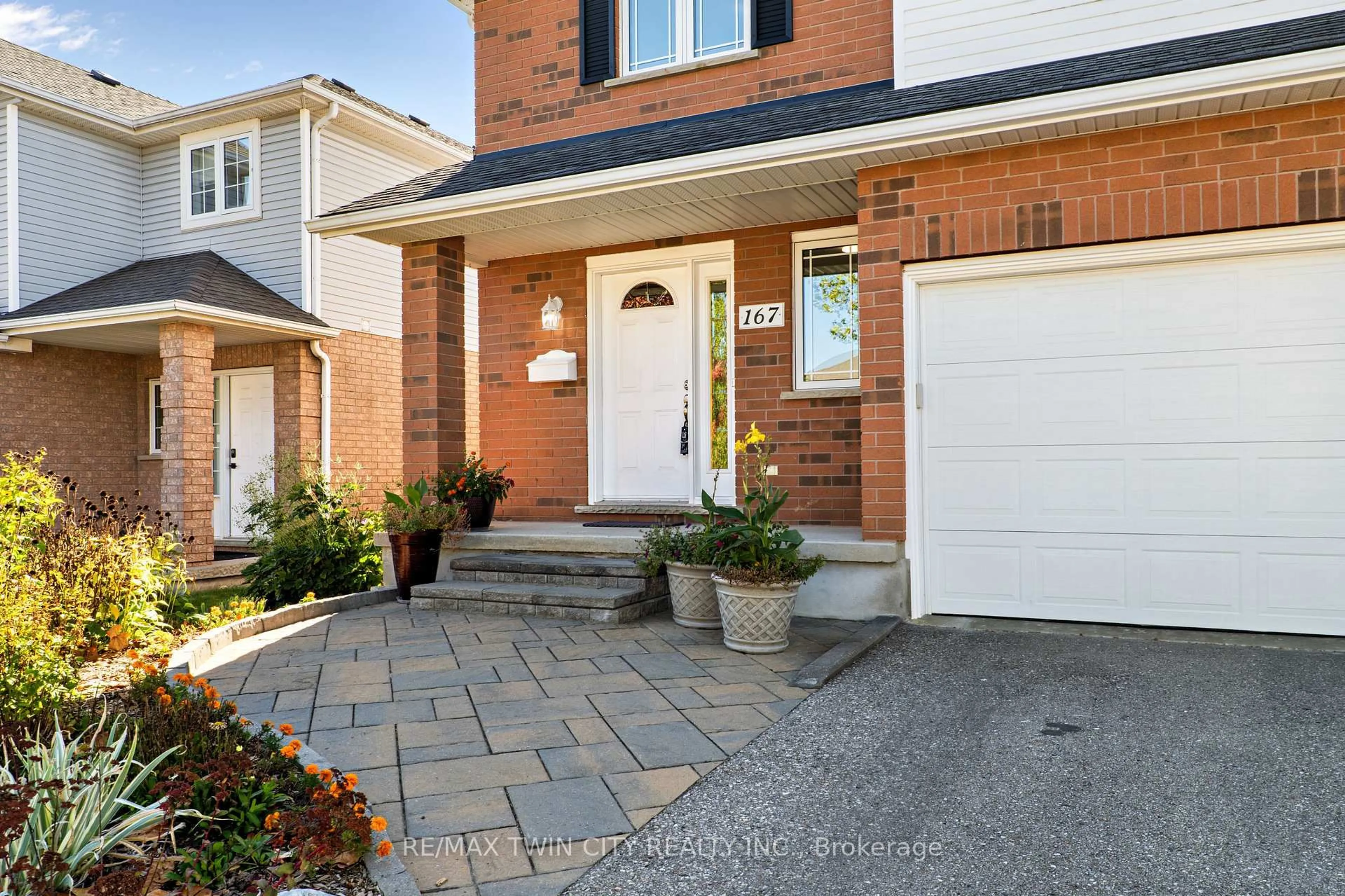 Home with brick exterior material, street for 167 Bridgewater Cres, Waterloo Ontario N2T 2M1