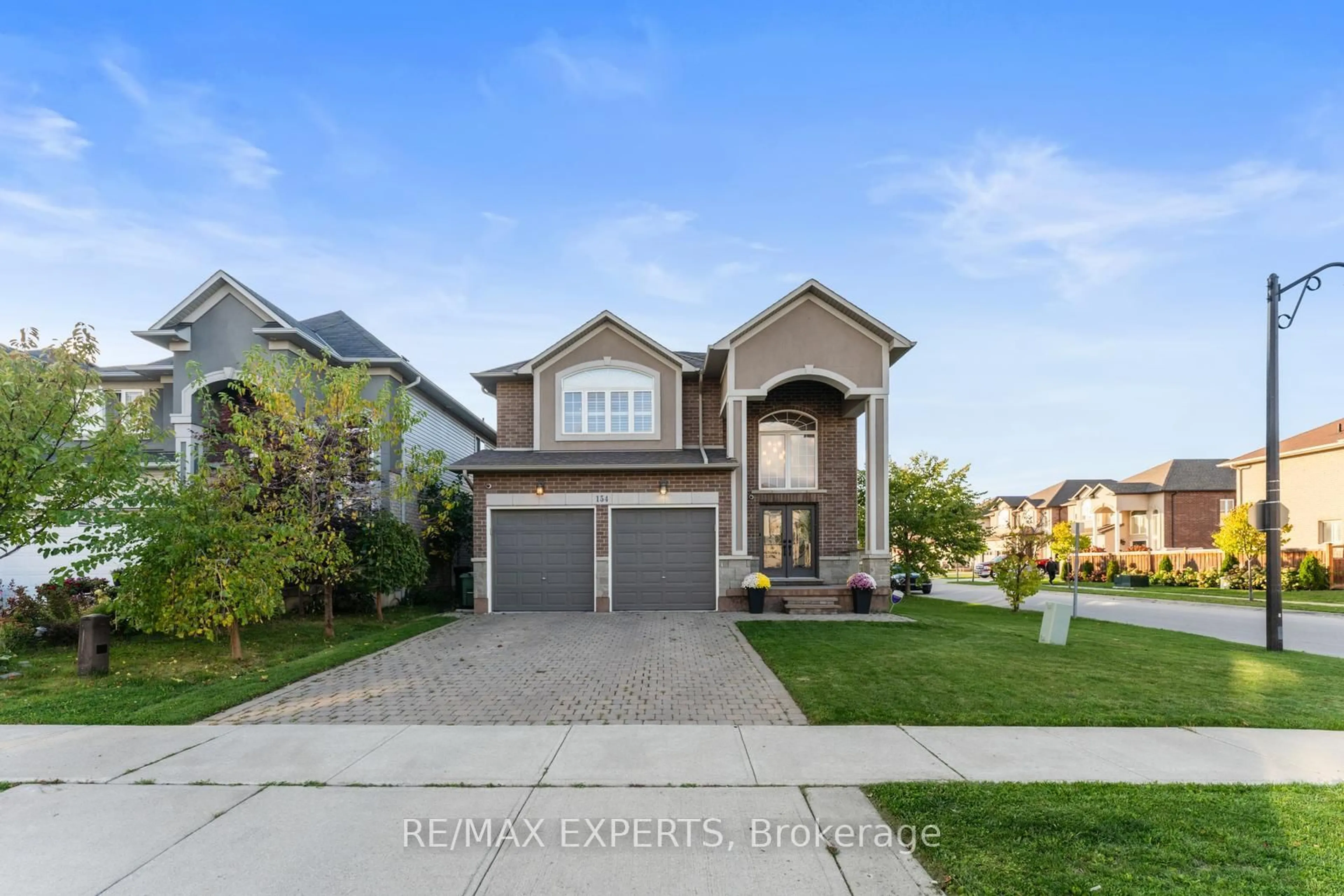 Home with brick exterior material, street for 154 Davinci Blvd, Hamilton Ontario L9B 0G6