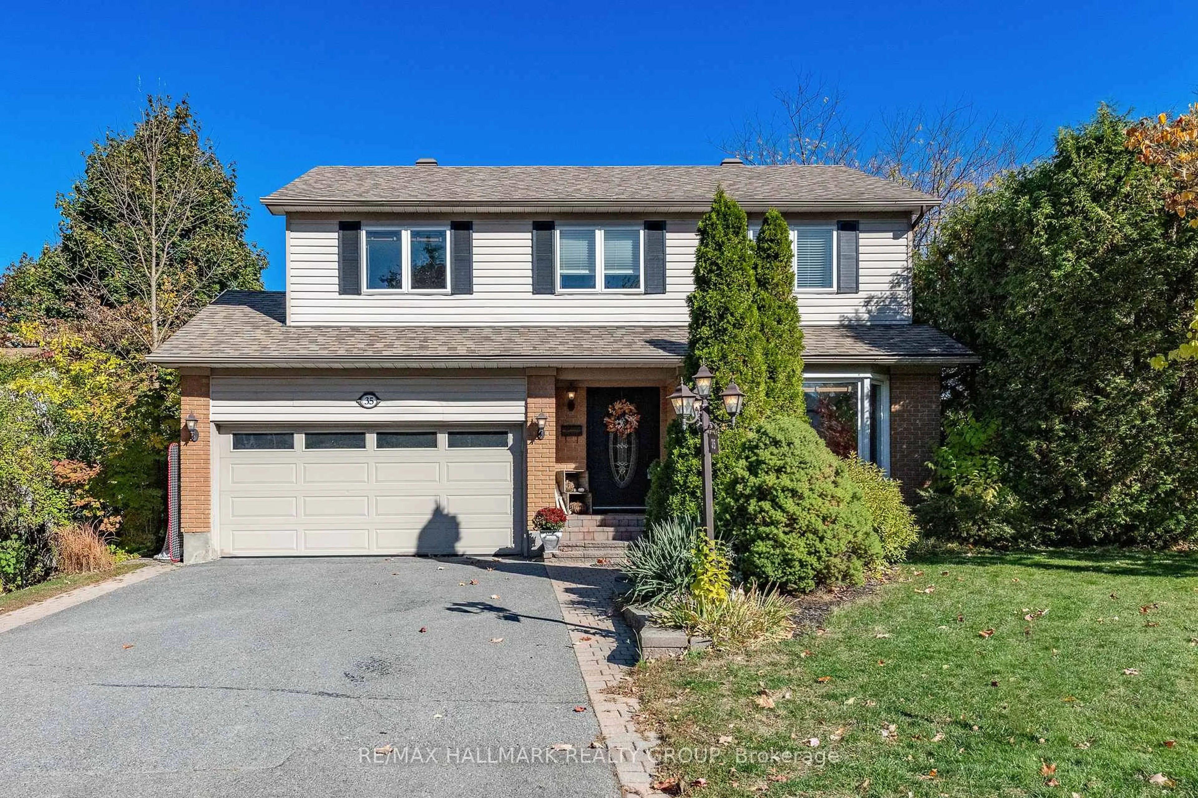 Home with brick exterior material, street for 35 St Remy Dr, Barrhaven Ontario K2J 1H5