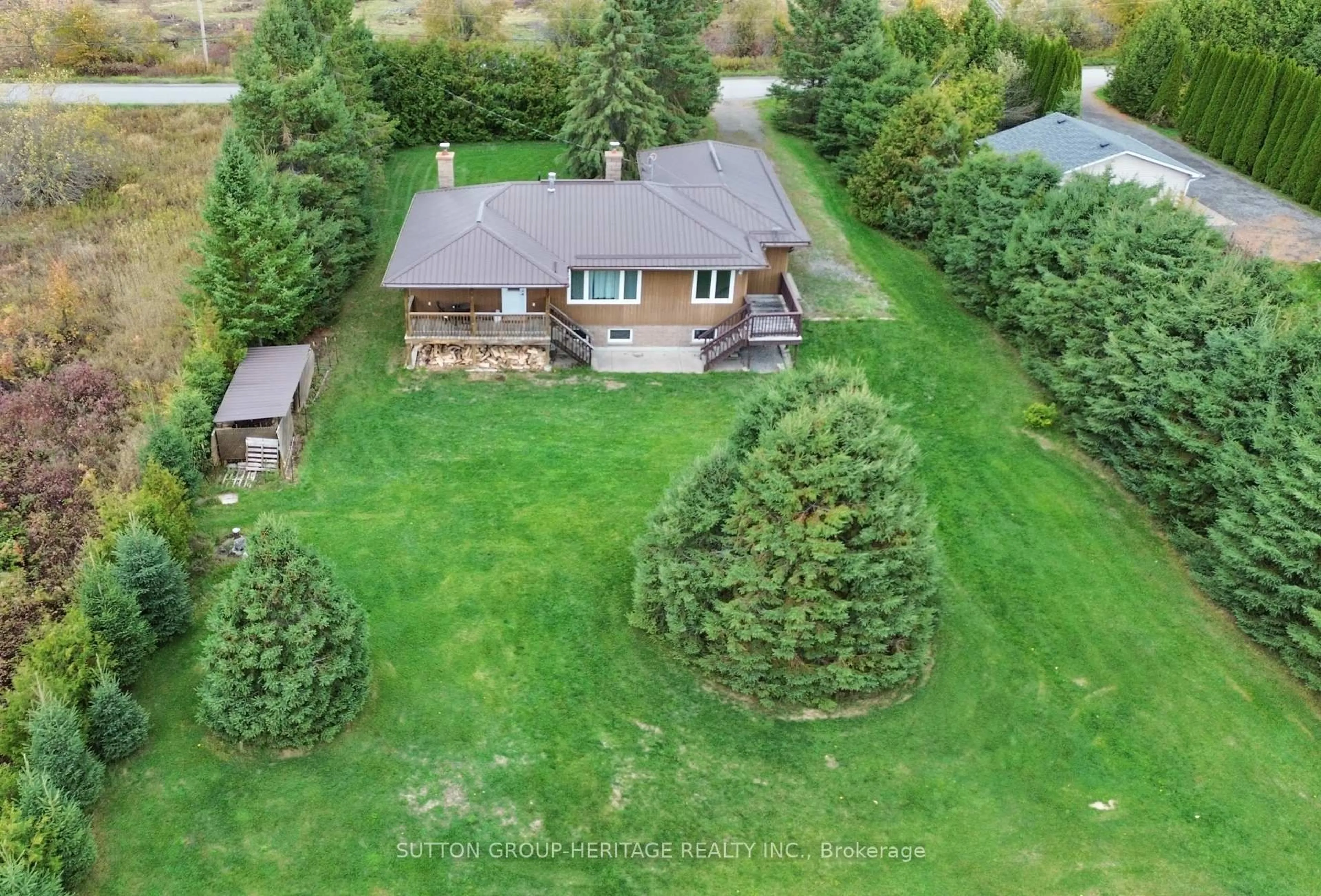 A pic from outside/outdoor area/front of a property/back of a property/a pic from drone, unknown for 584 Rohallion Rd, Kawartha Lakes Ontario L0K 1B0