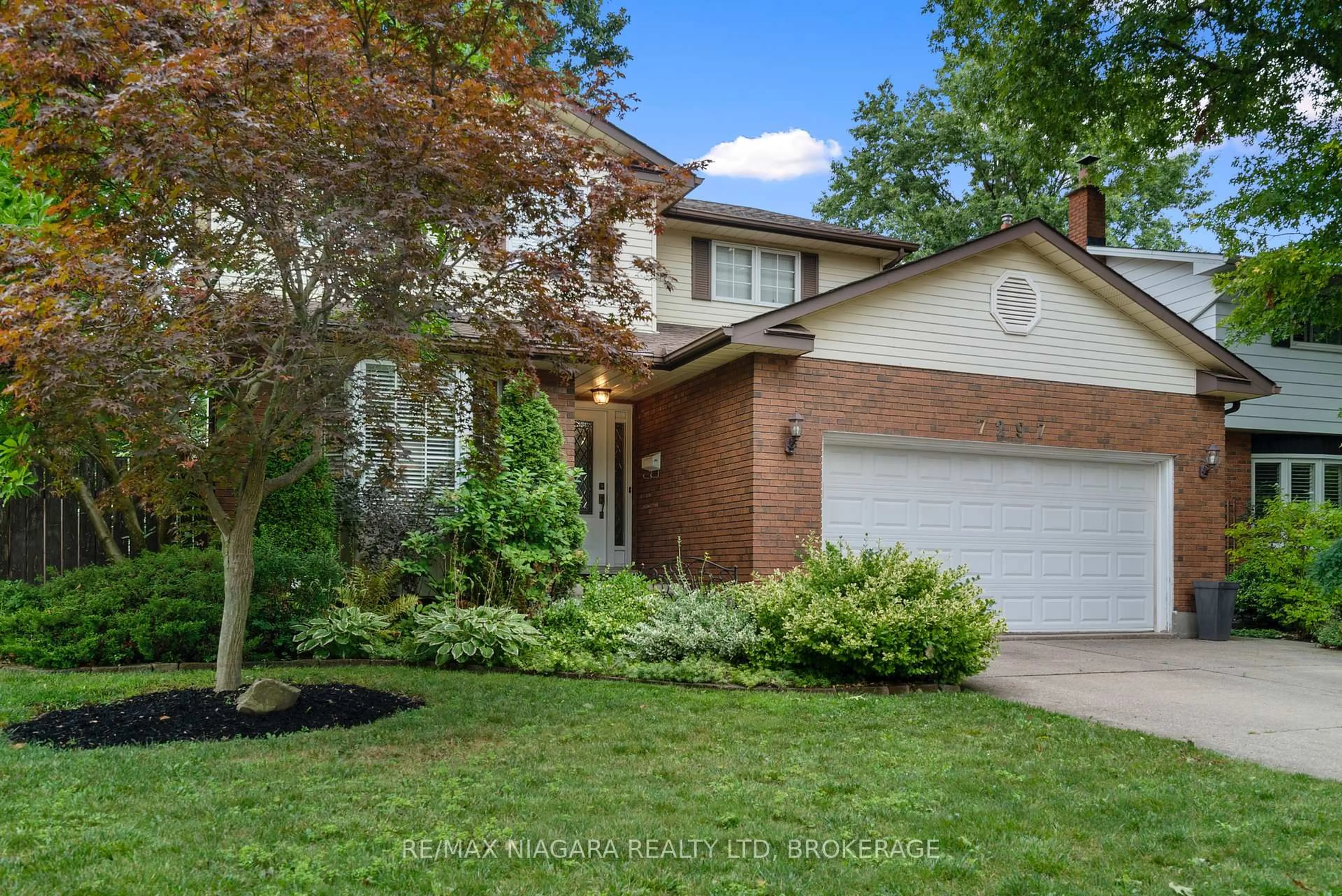 Home with brick exterior material, street for 7297 Green Boughs Rd, Niagara Falls Ontario L2J 3Y8
