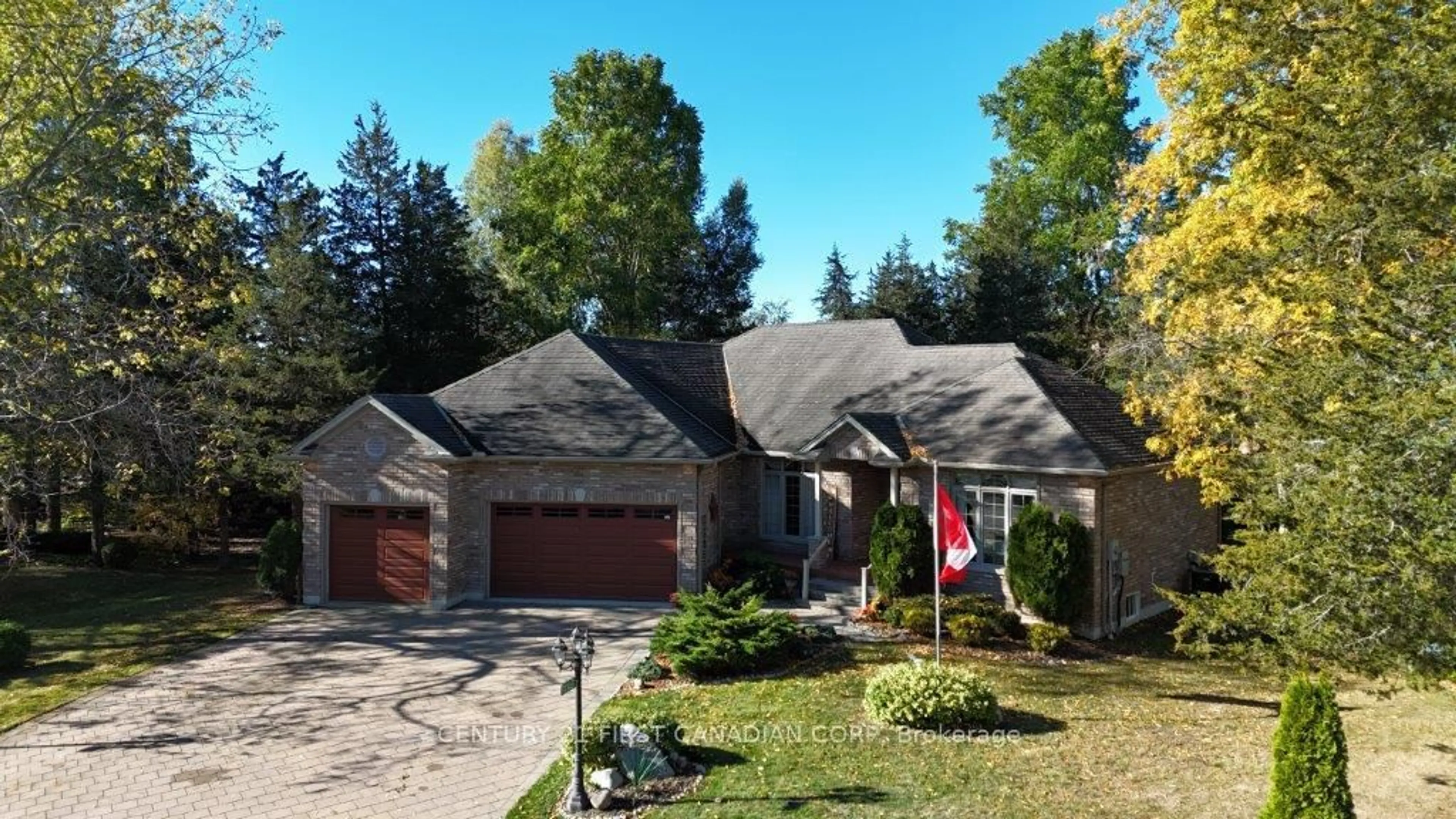Home with brick exterior material, street for 10145 Merrywood Dr, Lambton Shores Ontario N0M 1T0