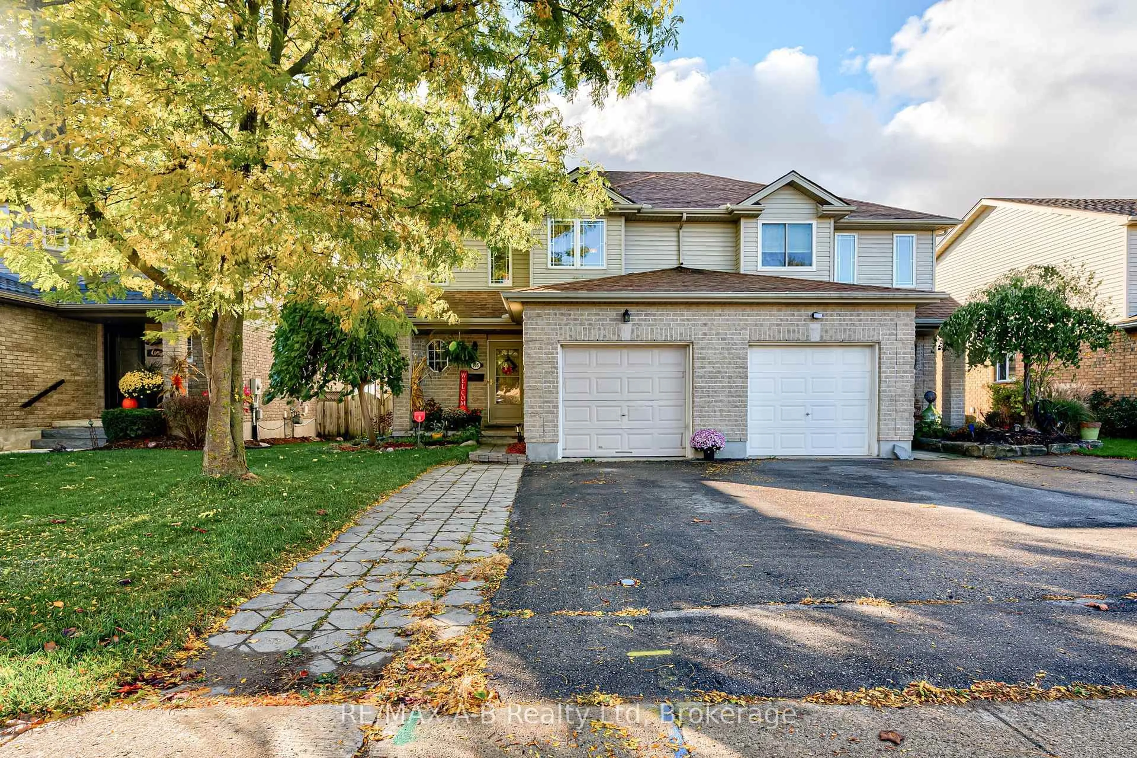 Home with brick exterior material, street for 105 Maxwell St, St. Marys Ontario N4X 0A2