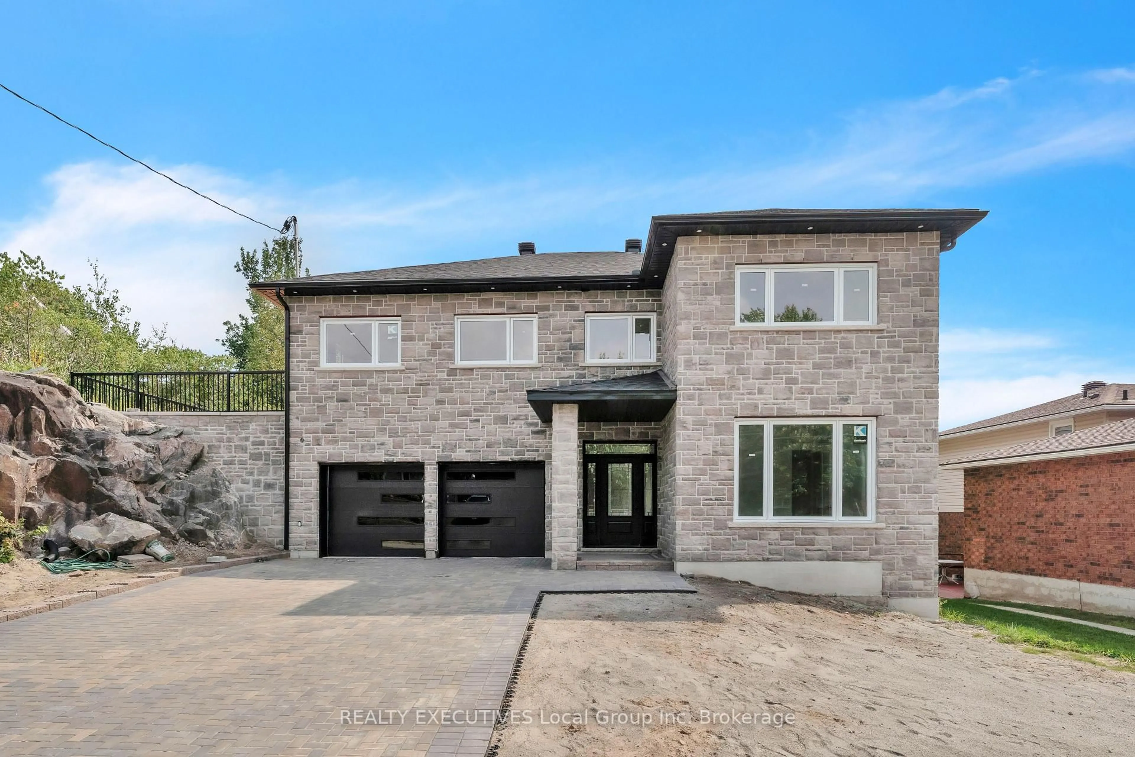 Home with brick exterior material, street for 29 Shallot Cres, North Bay Ontario P1A 3V7