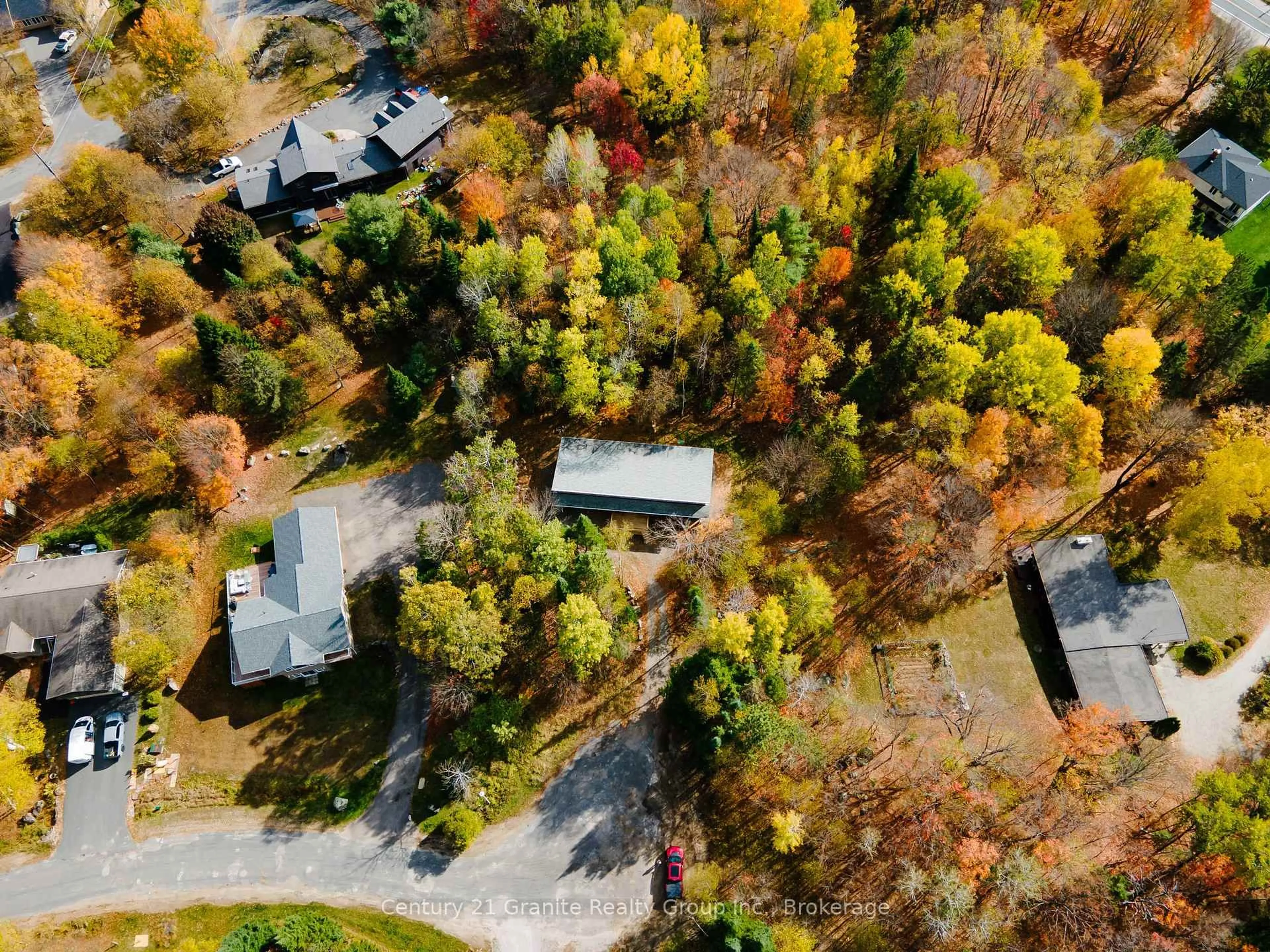 A pic from outside/outdoor area/front of a property/back of a property/a pic from drone, forest/trees view for 51 FARMCREST Ave, Dysart et al Ontario K0M 1S0