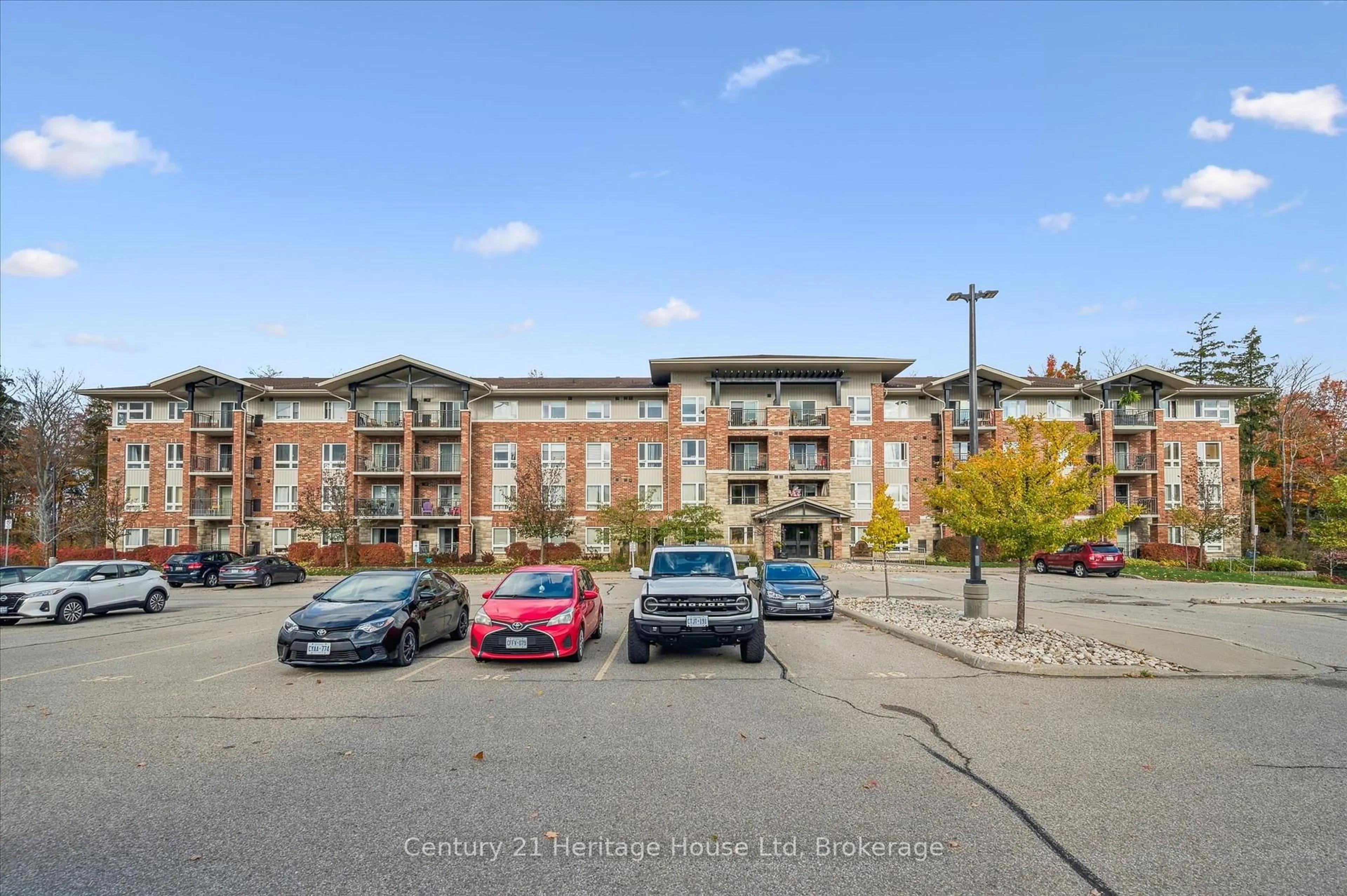 A pic from outside/outdoor area/front of a property/back of a property/a pic from drone, street for 625 St David St #414, Centre Wellington Ontario N1M 0A8