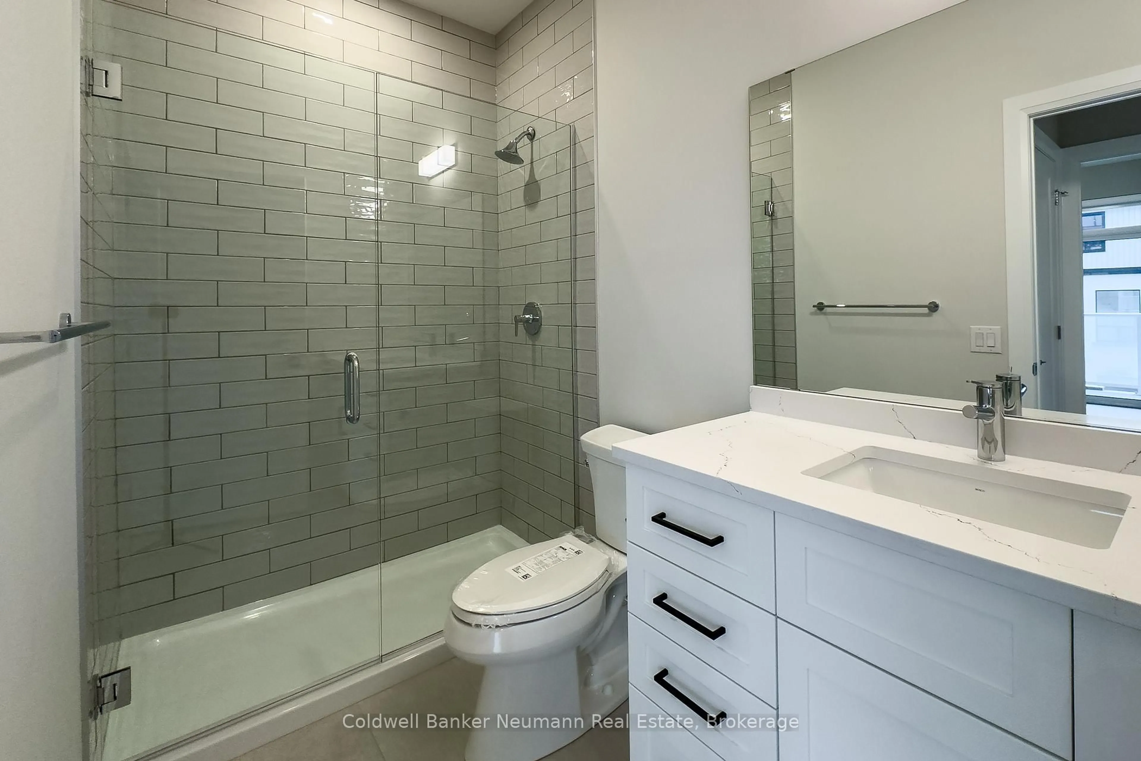 Standard bathroom, ceramic/tile floor for 71 Wyndham St #209, Guelph Ontario N1E 5R3