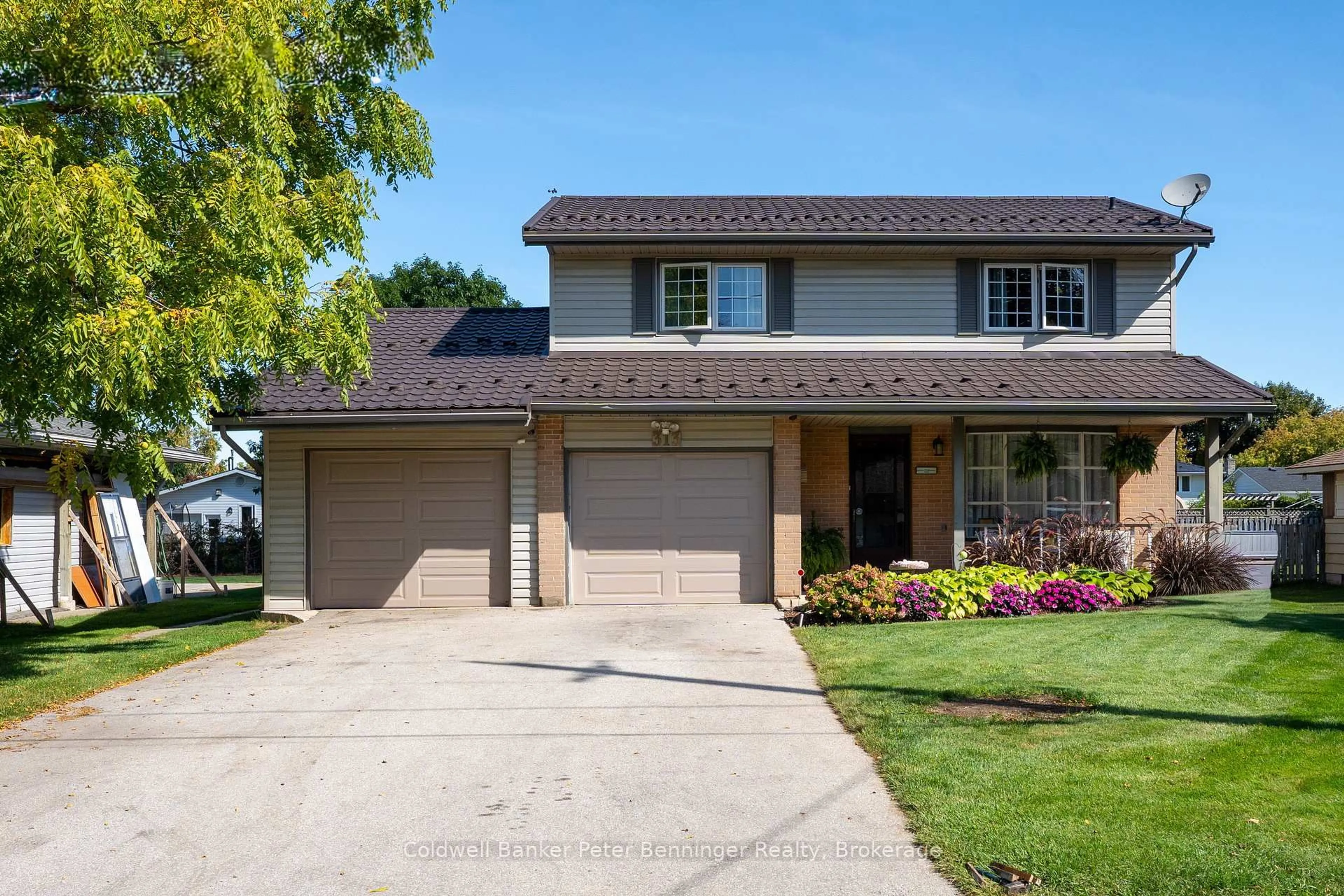 Home with brick exterior material, street for 313 Market St, Saugeen Shores Ontario N0H 2C0