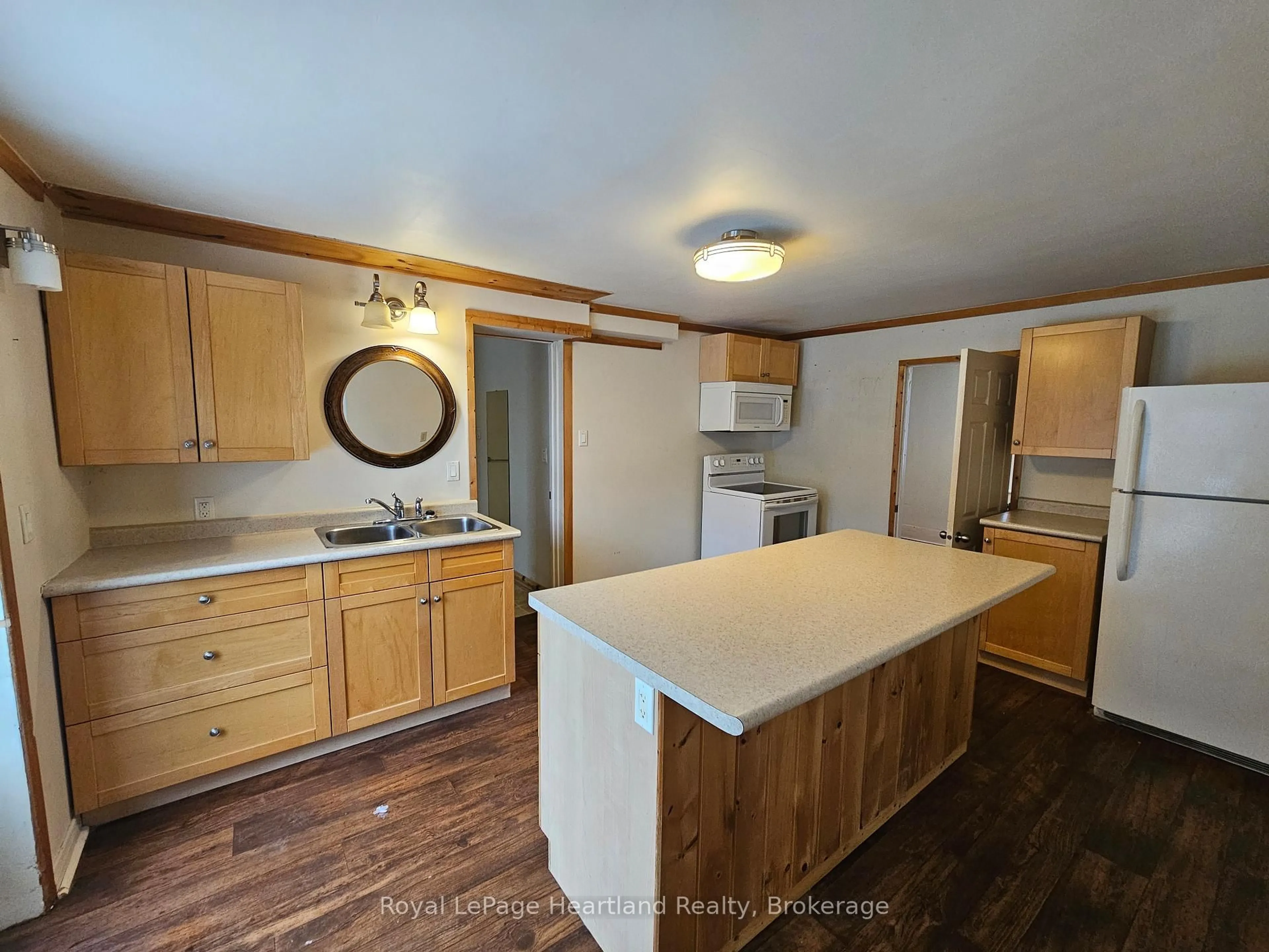 Open concept kitchen, wood/laminate floor for 43 Trafalgar St, Goderich Ontario N7A 1T3