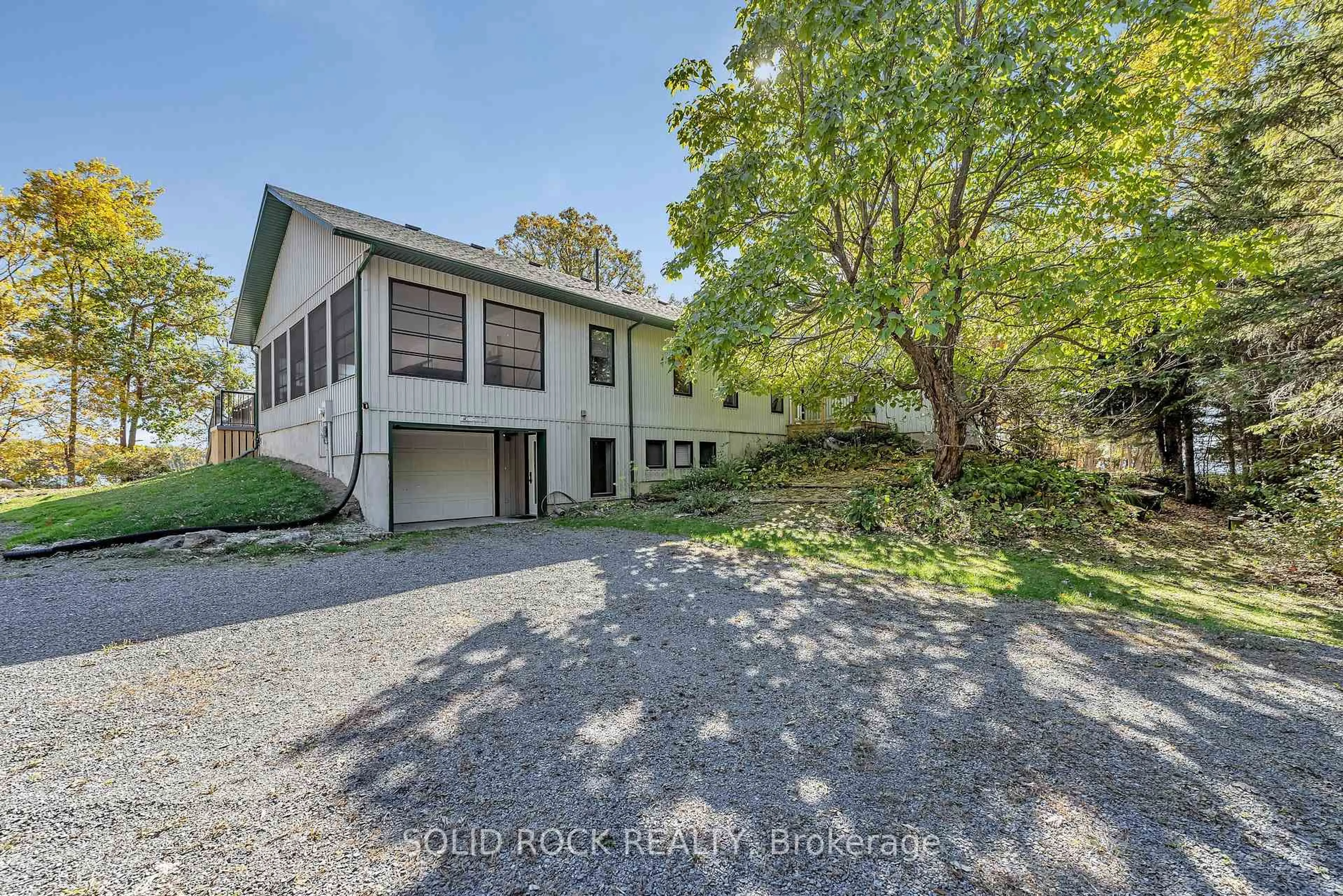A pic from outside/outdoor area/front of a property/back of a property/a pic from drone, street for 398 Coons Rd, Rideau Lakes Ontario K0G 1E0
