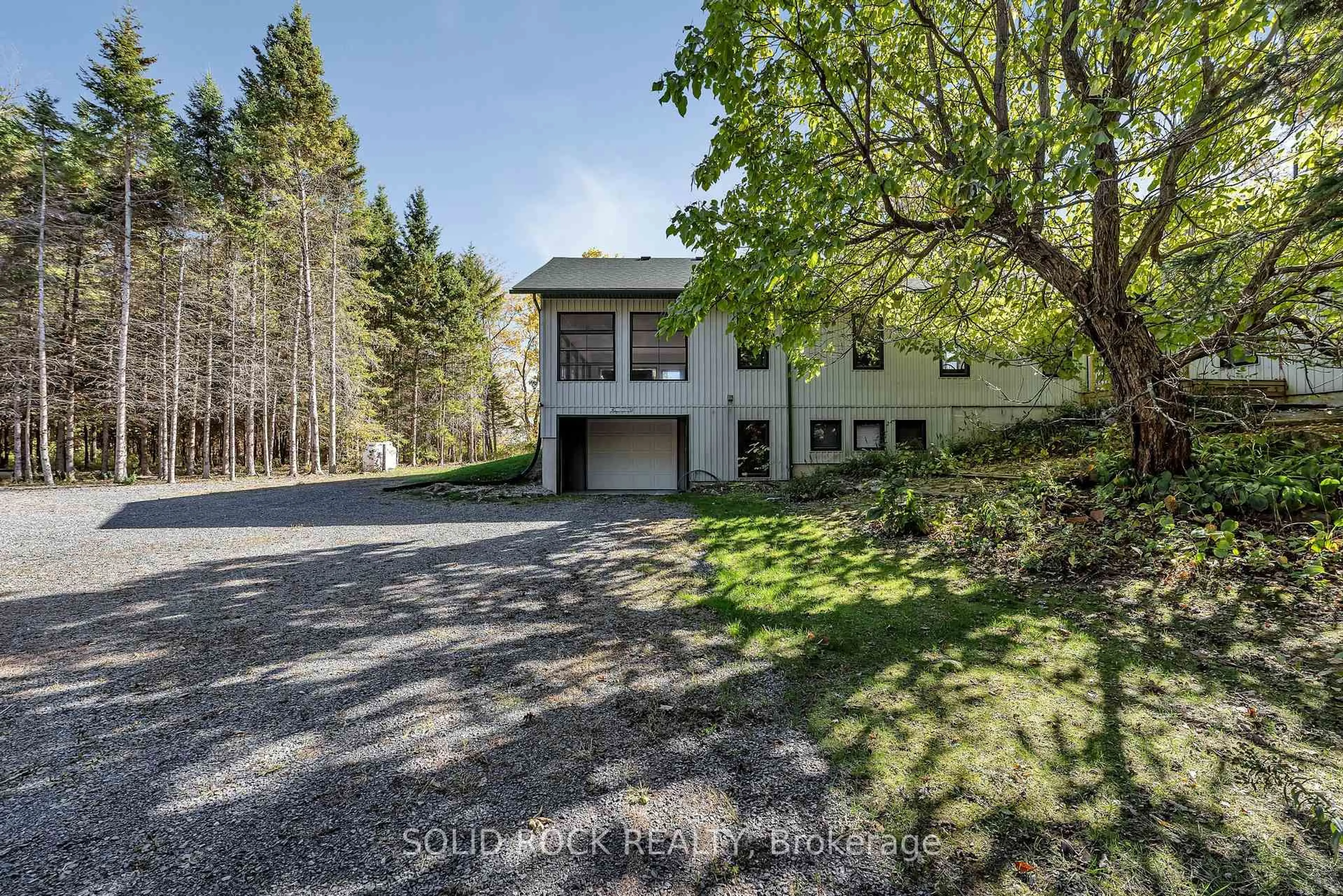 A pic from outside/outdoor area/front of a property/back of a property/a pic from drone, unknown for 398 Coons Rd, Rideau Lakes Ontario K0G 1E0
