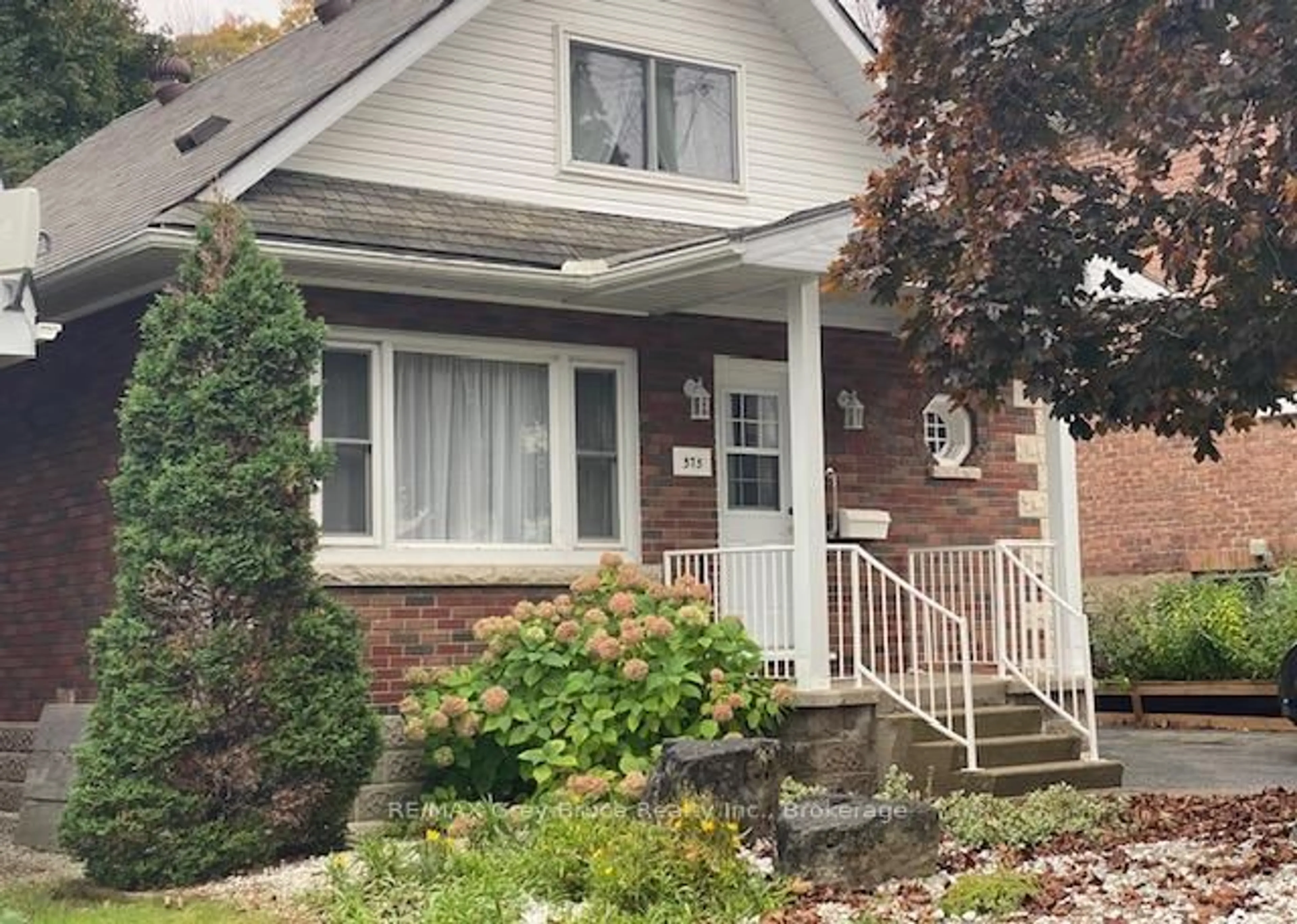 Home with brick exterior material, street for 575 13th 'A' St, Owen Sound Ontario N4K 3X5