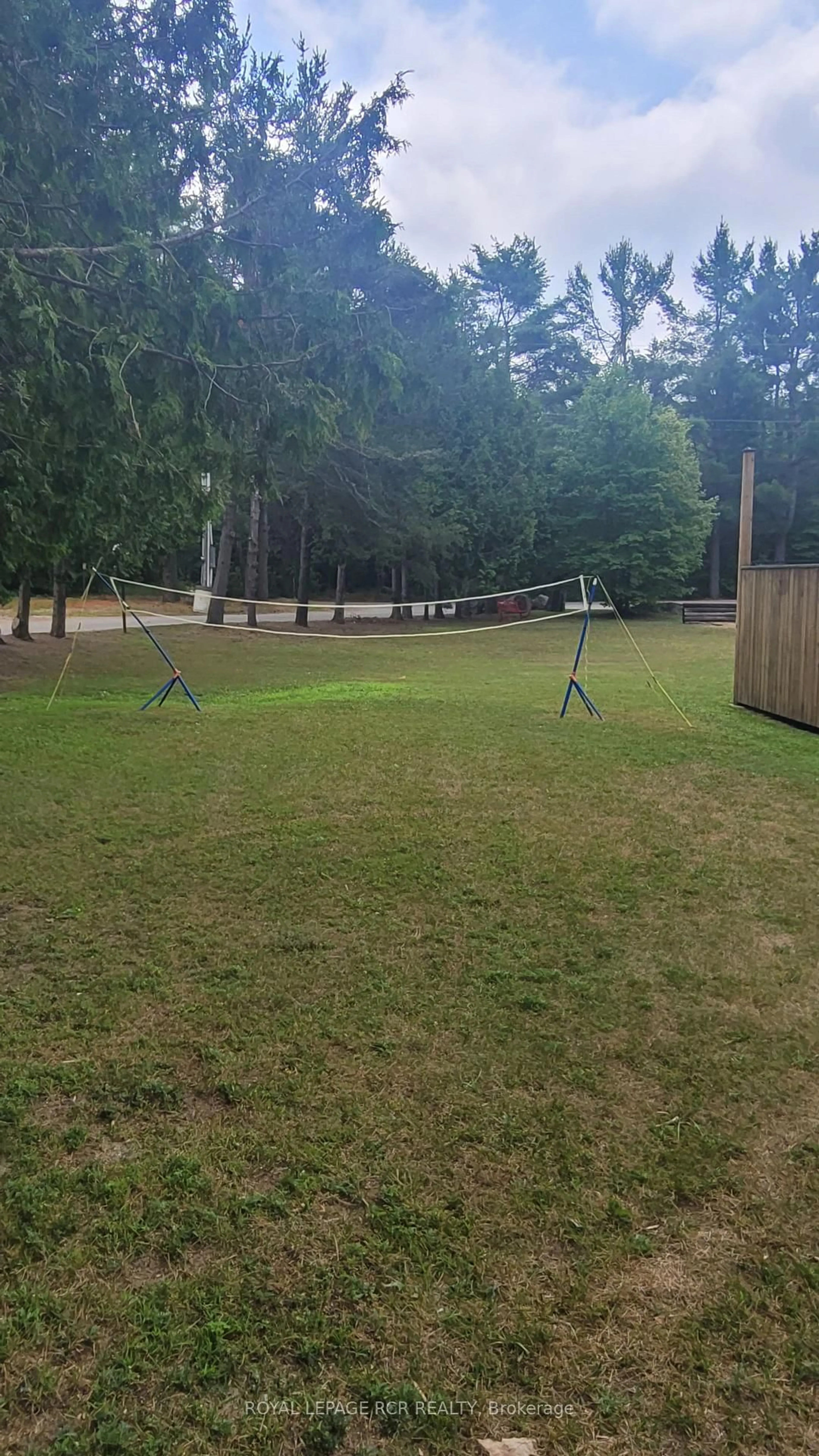 A pic from outside/outdoor area/front of a property/back of a property/a pic from drone, forest/trees view for 1007 Racoon Rd #31, Gravenhurst Ontario P1P 1R1