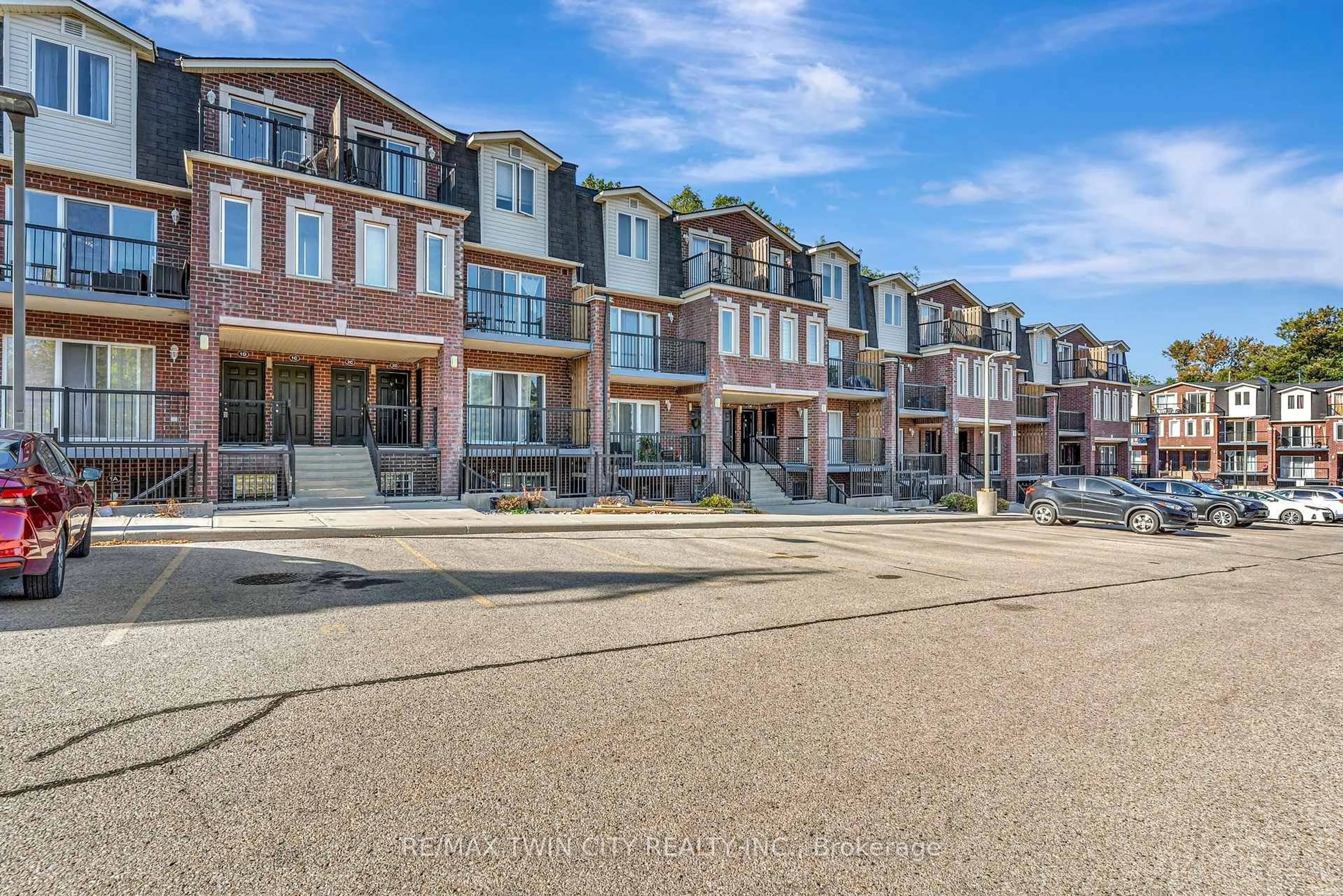 A pic from outside/outdoor area/front of a property/back of a property/a pic from drone, street for 45 Cedarhill Cres #1D, Kitchener Ontario N2E 0A2