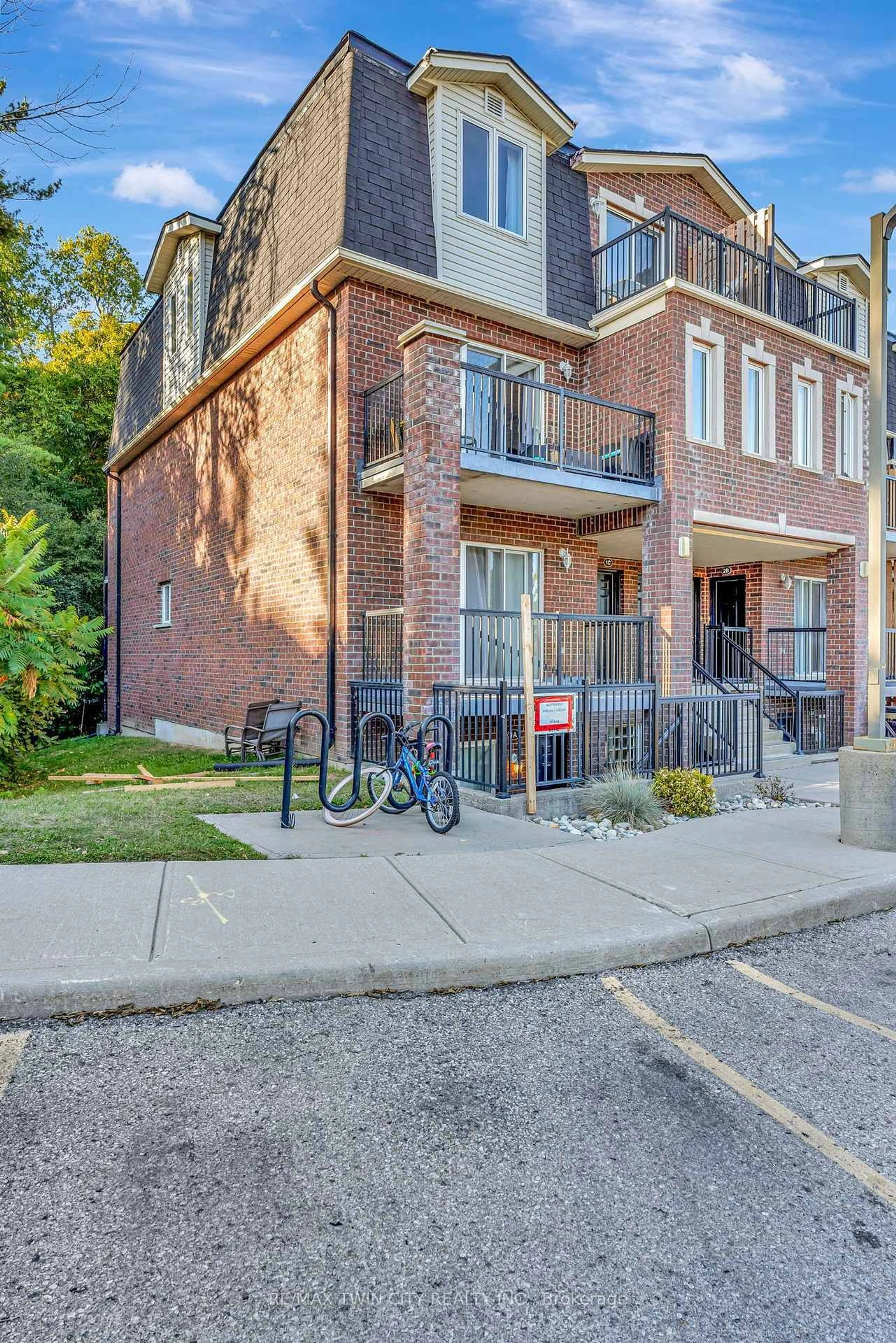 Home with brick exterior material, street for 45 Cedarhill Cres #1D, Kitchener Ontario N2E 0A2