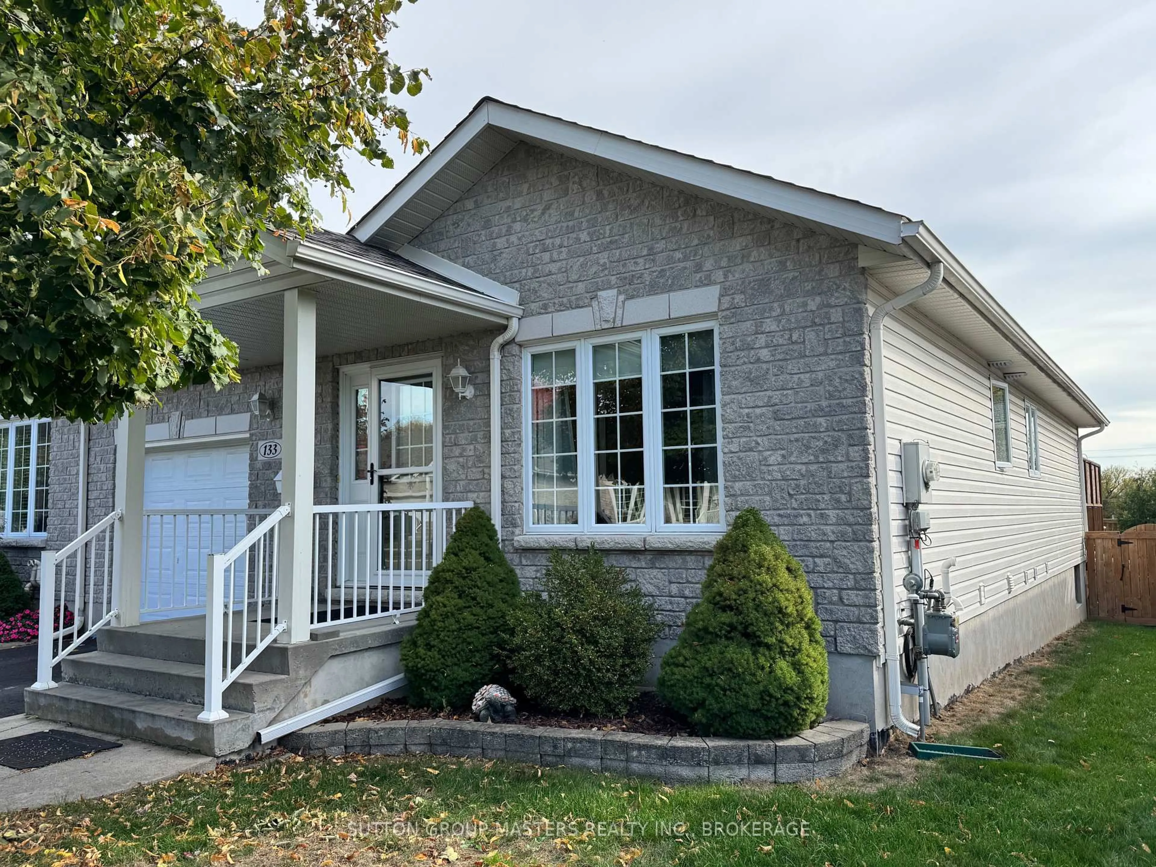 Home with vinyl exterior material, street for 133 Ellesmeer Ave, Kingston Ontario K7P 3H9