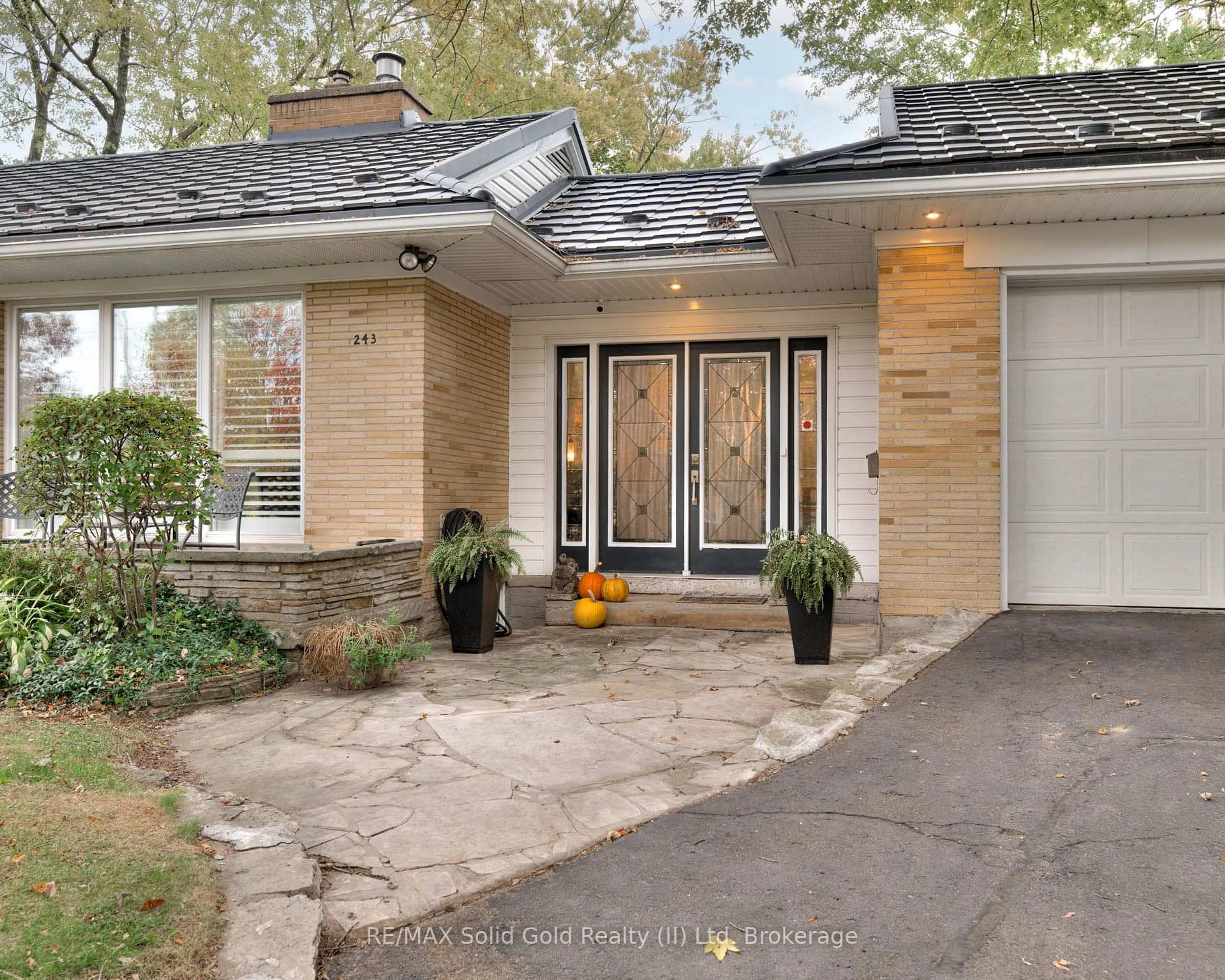 Home with brick exterior material, street for 243 Lincoln Rd, Waterloo Ontario N2J 2P4