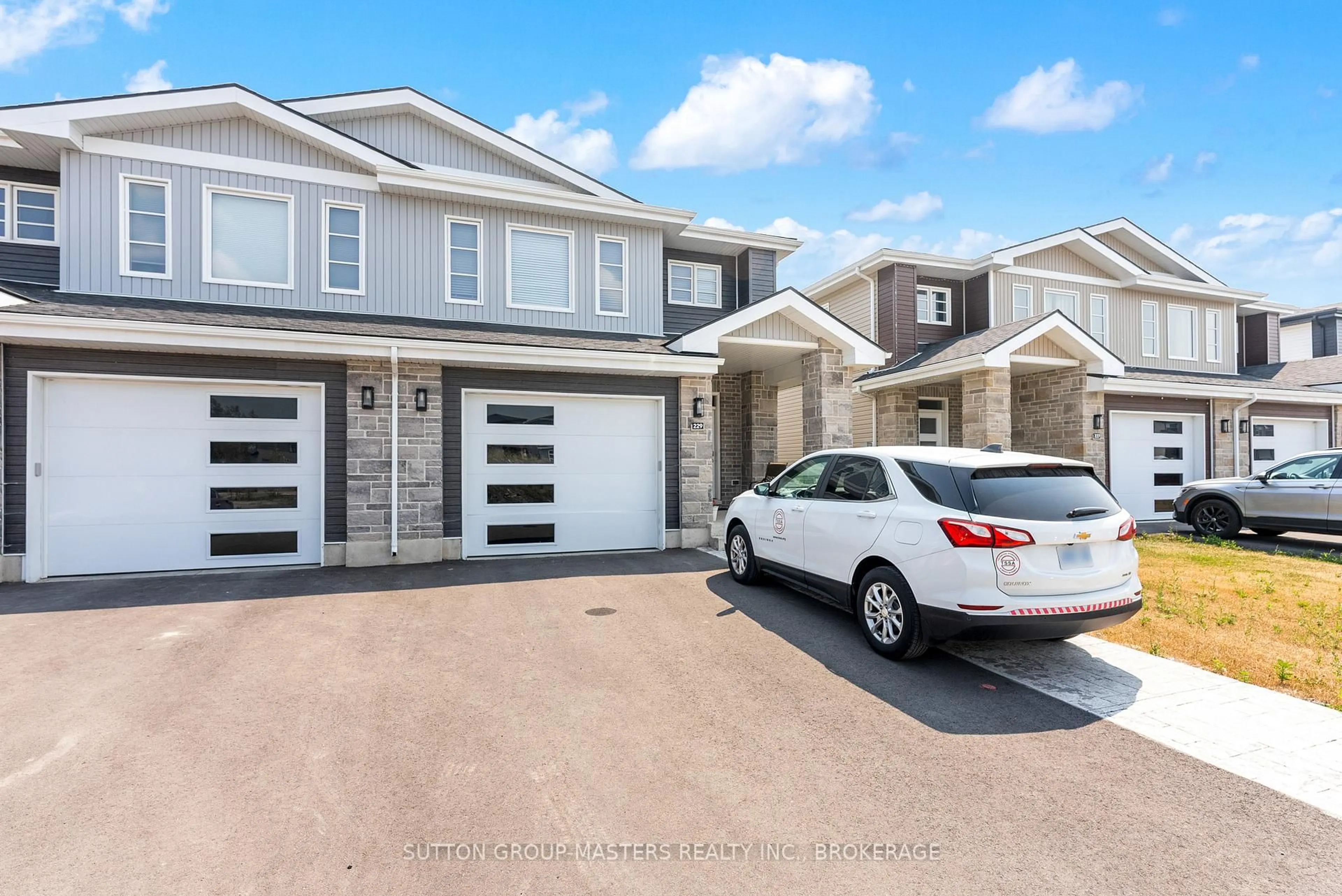 Home with vinyl exterior material, street for 229 Superior Dr, Loyalist Ontario K7N 0E9