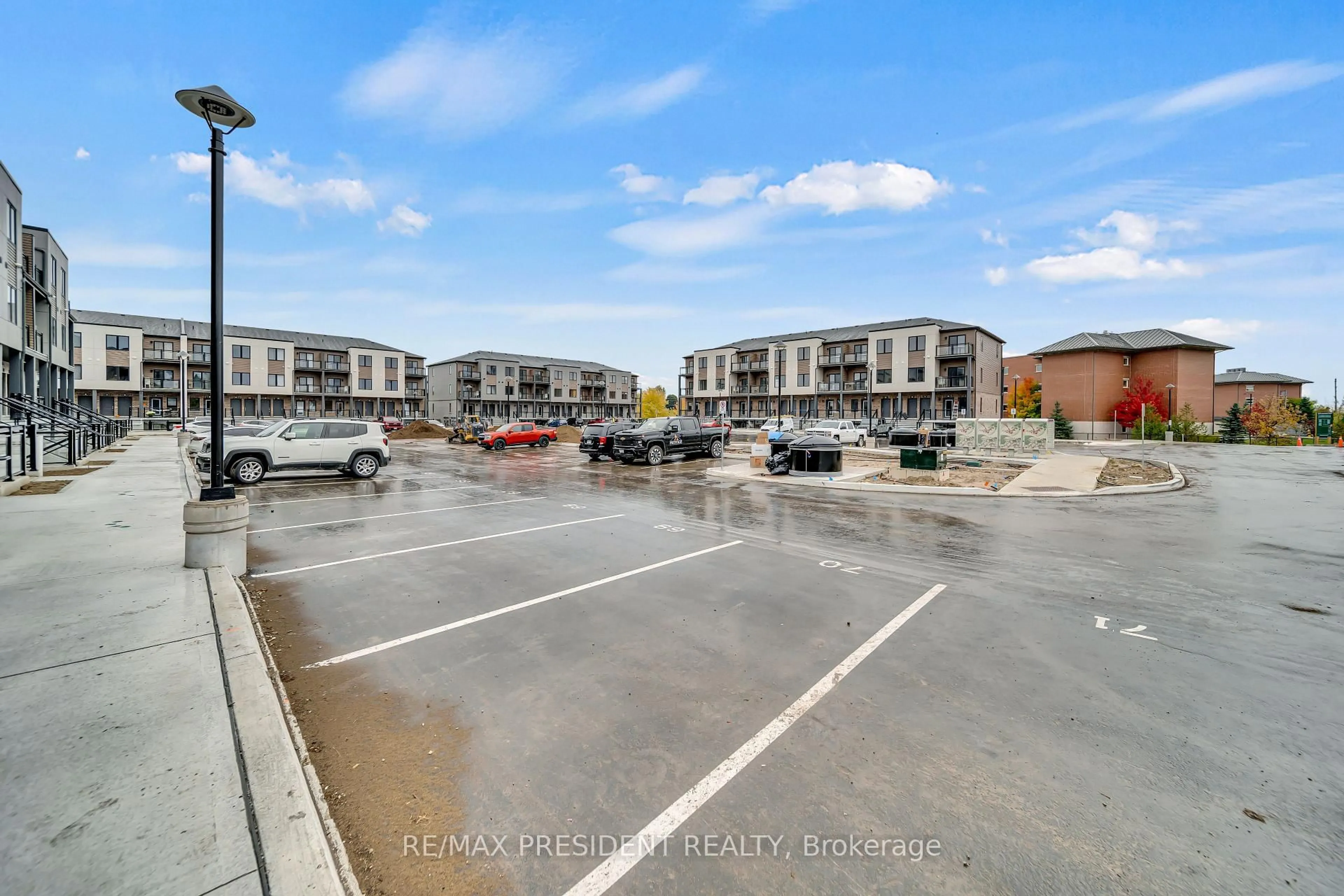 A pic from outside/outdoor area/front of a property/back of a property/a pic from drone, street for 940 David St #81, Centre Wellington Ontario N1M 0L7