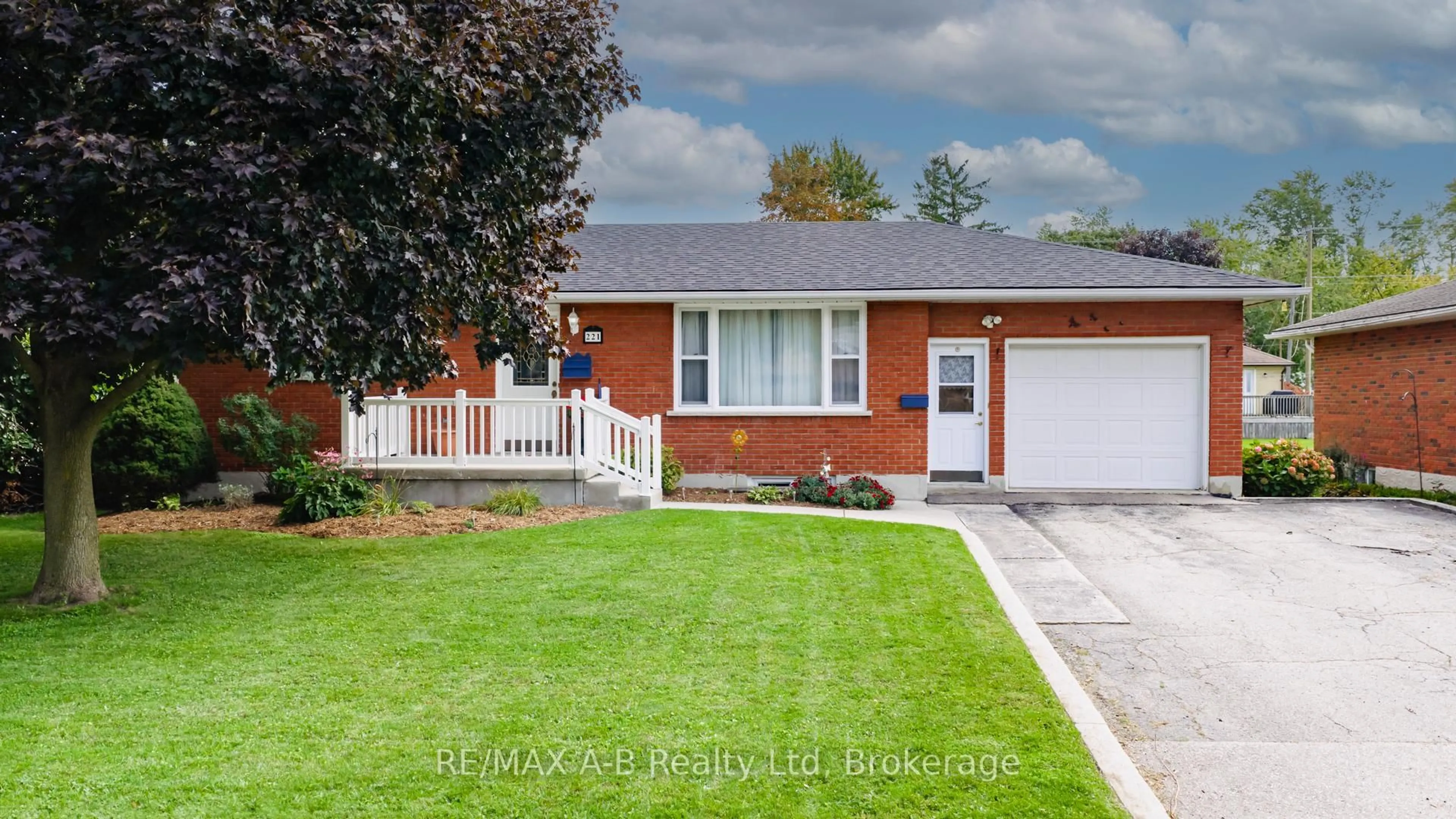 Home with brick exterior material, street for 221 Coulton Dr, West Perth Ontario N0K 1N0