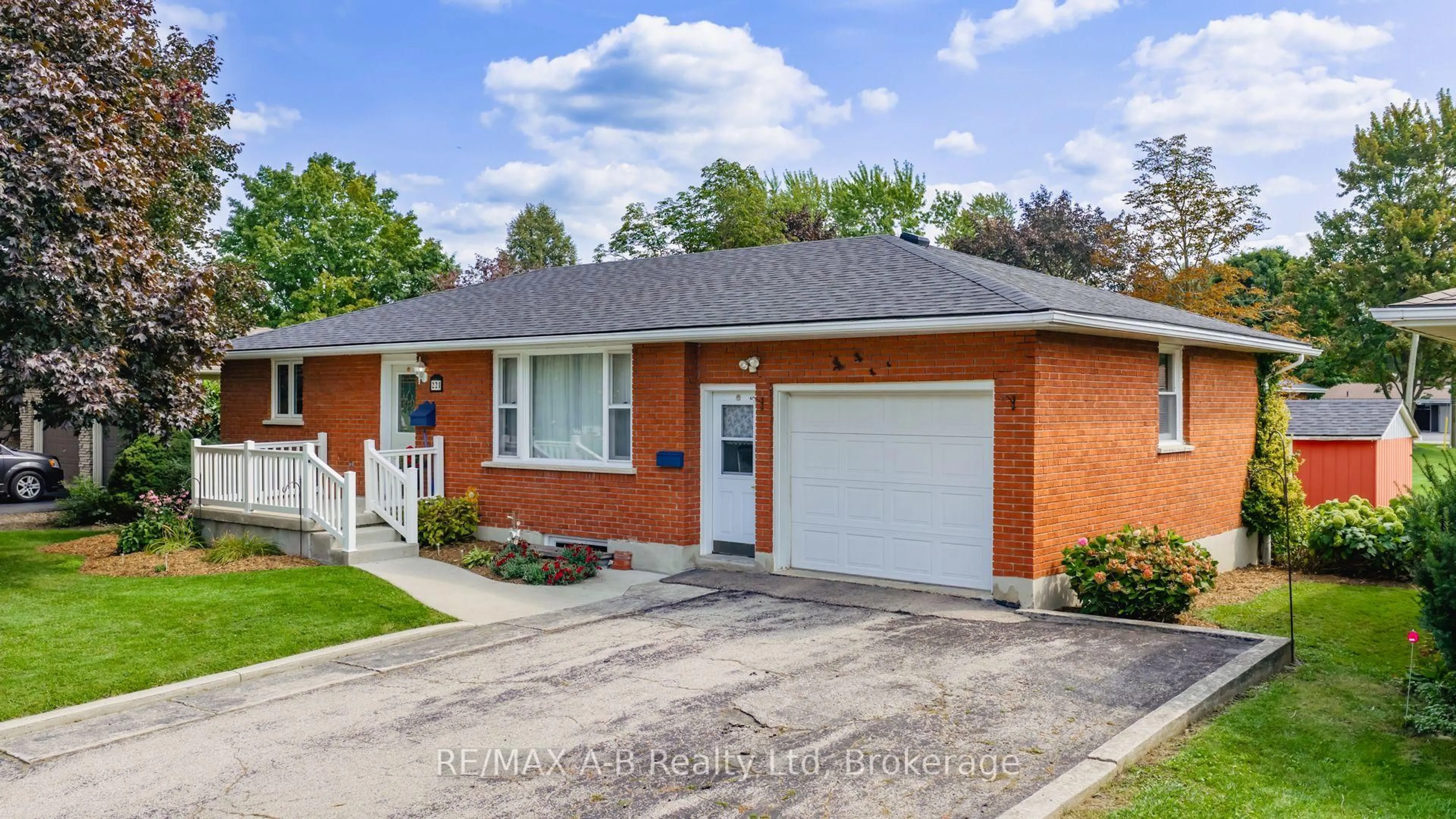 Home with brick exterior material, street for 221 Coulton Dr, West Perth Ontario N0K 1N0