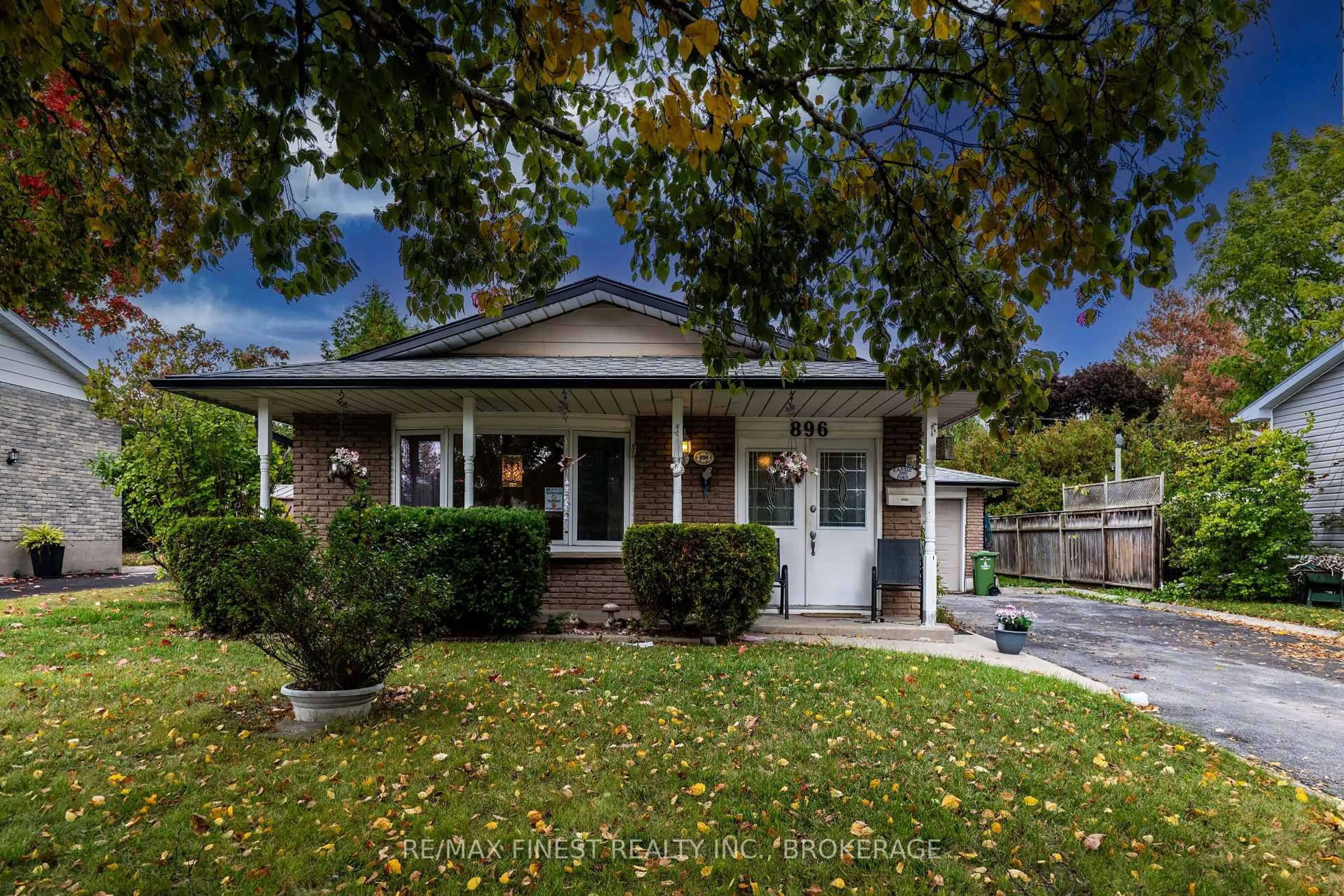 Home with vinyl exterior material, street for 896 Development Dr, Kingston Ontario K7M 5T1
