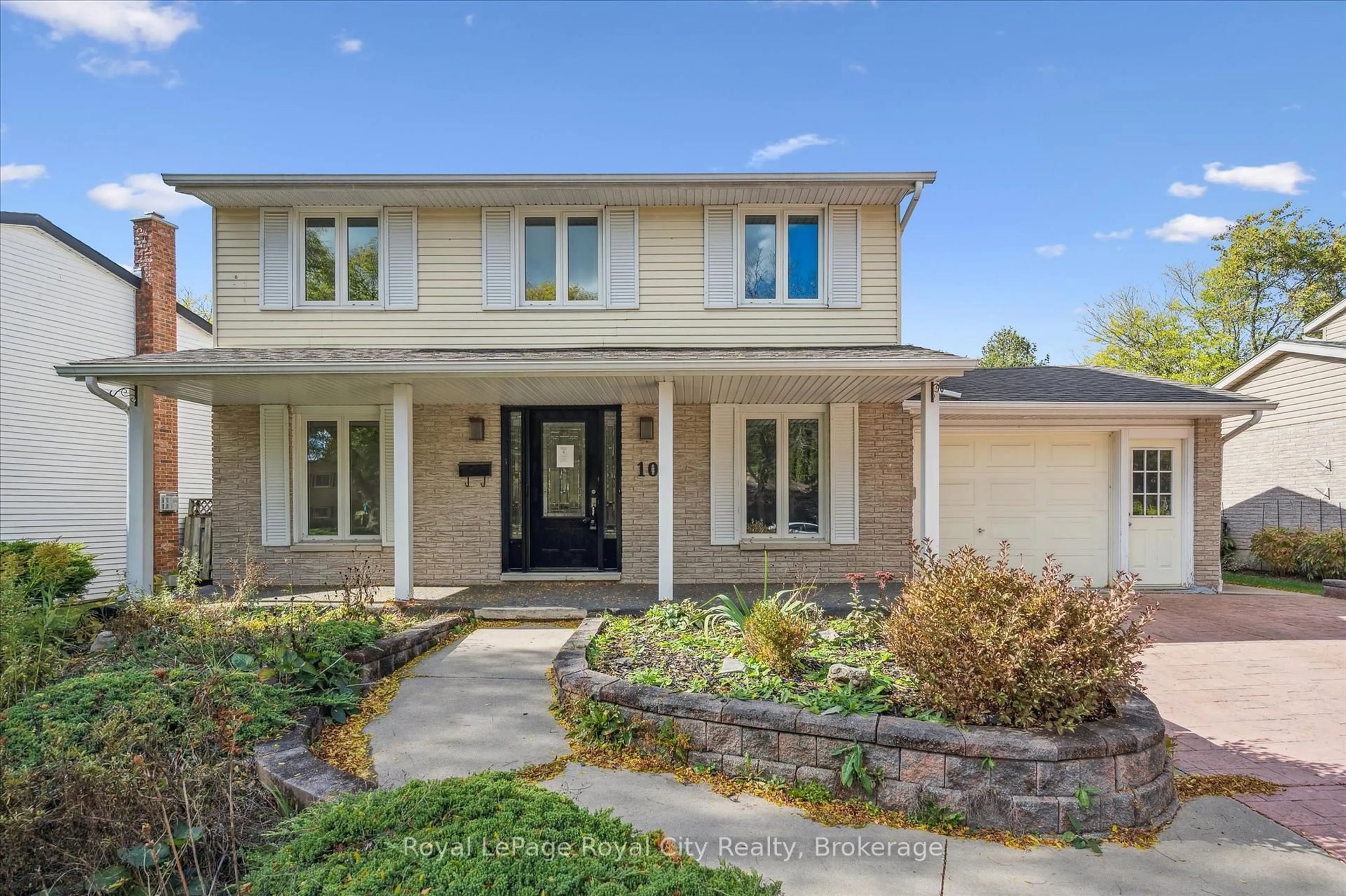 Home with brick exterior material, street for 10 Woodborough Rd, Guelph Ontario N1G 3K5