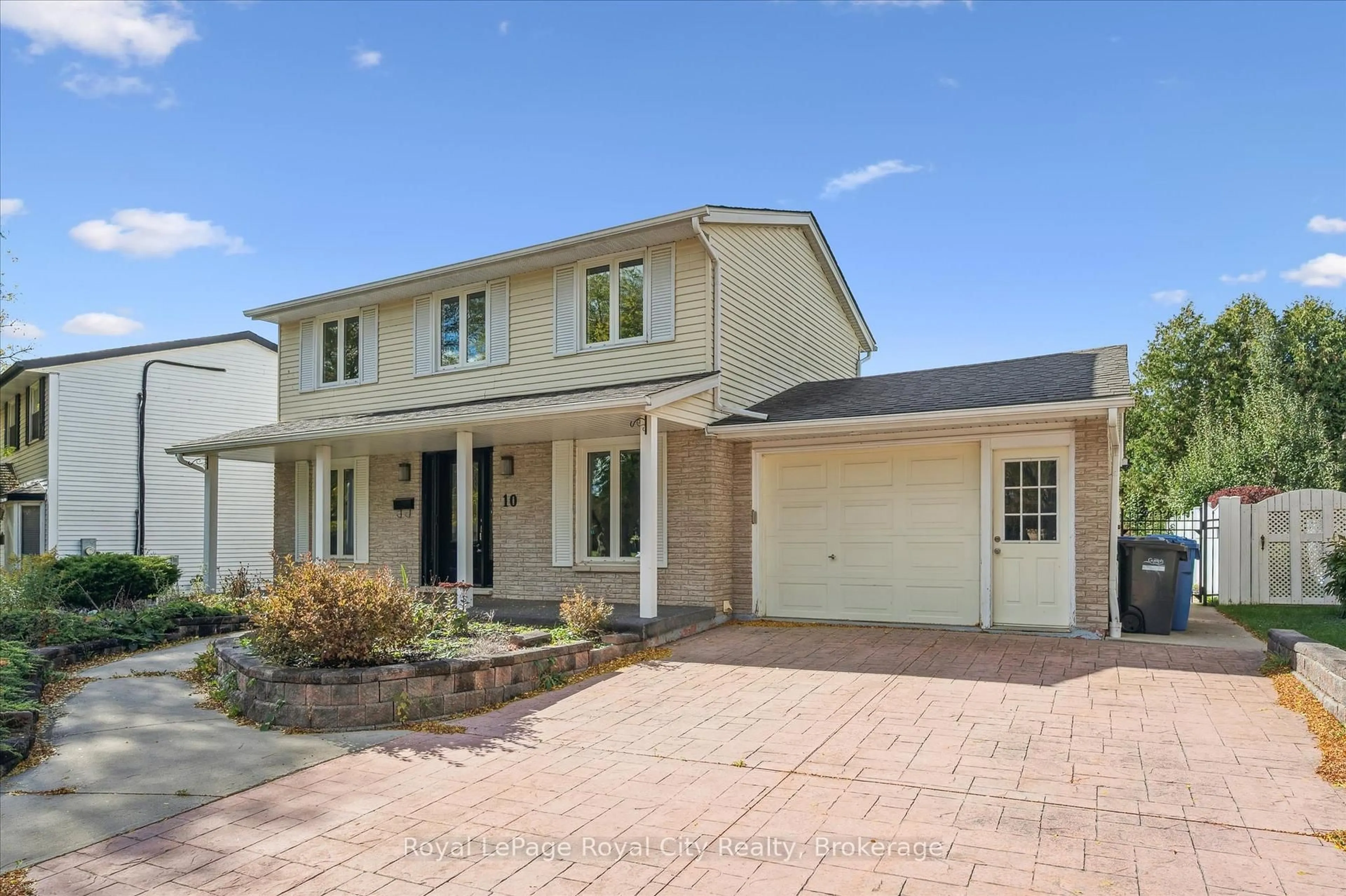 Home with vinyl exterior material, street for 10 Woodborough Rd, Guelph Ontario N1G 3K5