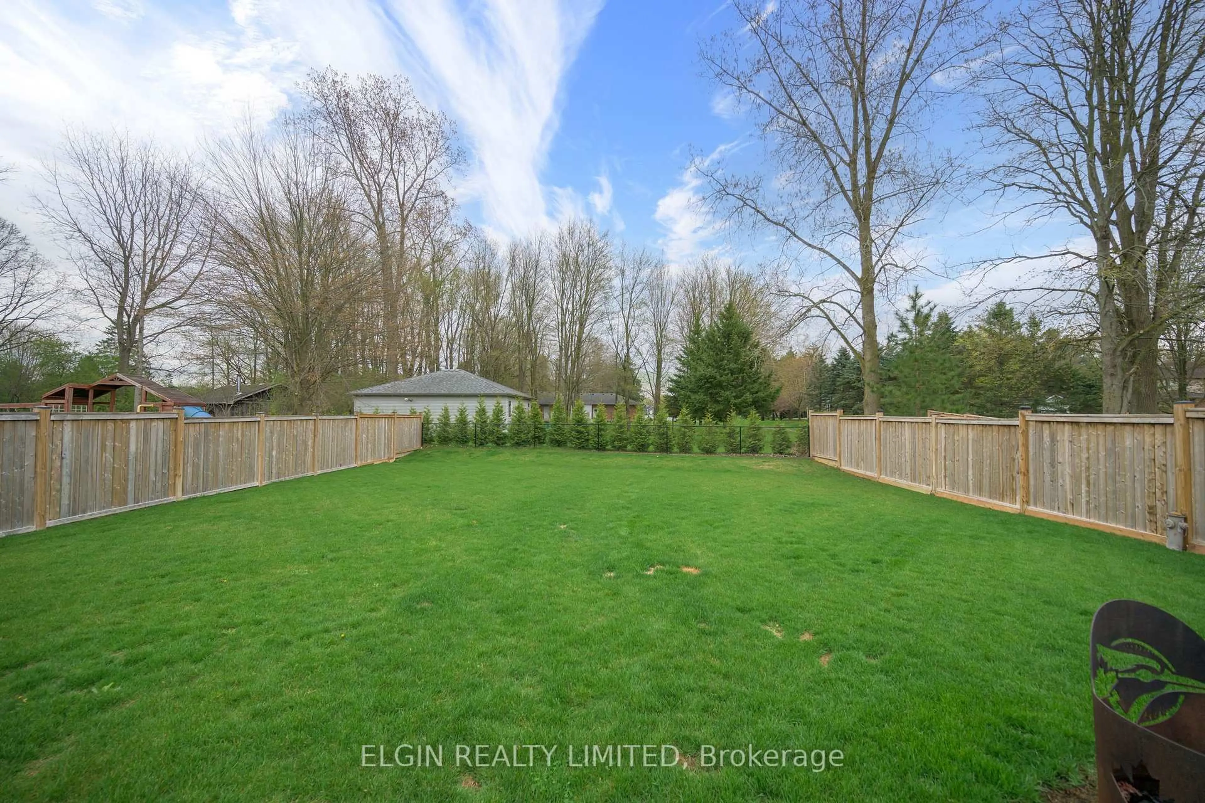 A pic from outside/outdoor area/front of a property/back of a property/a pic from drone, forest/trees view for 107 Optimist Dr, Southwold Ontario N5P 0G2