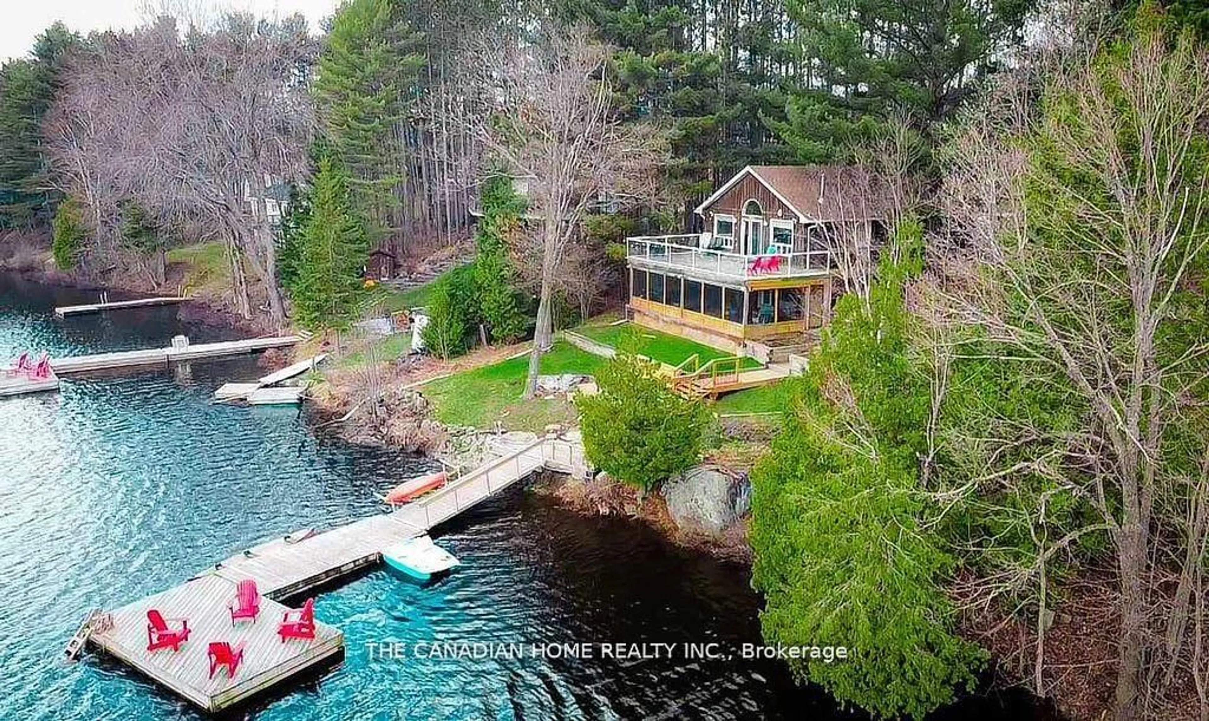 A pic from outside/outdoor area/front of a property/back of a property/a pic from drone, water/lake/river/ocean view for 92 Mckellar Lake Rd, McKellar Ontario P0G 1C0