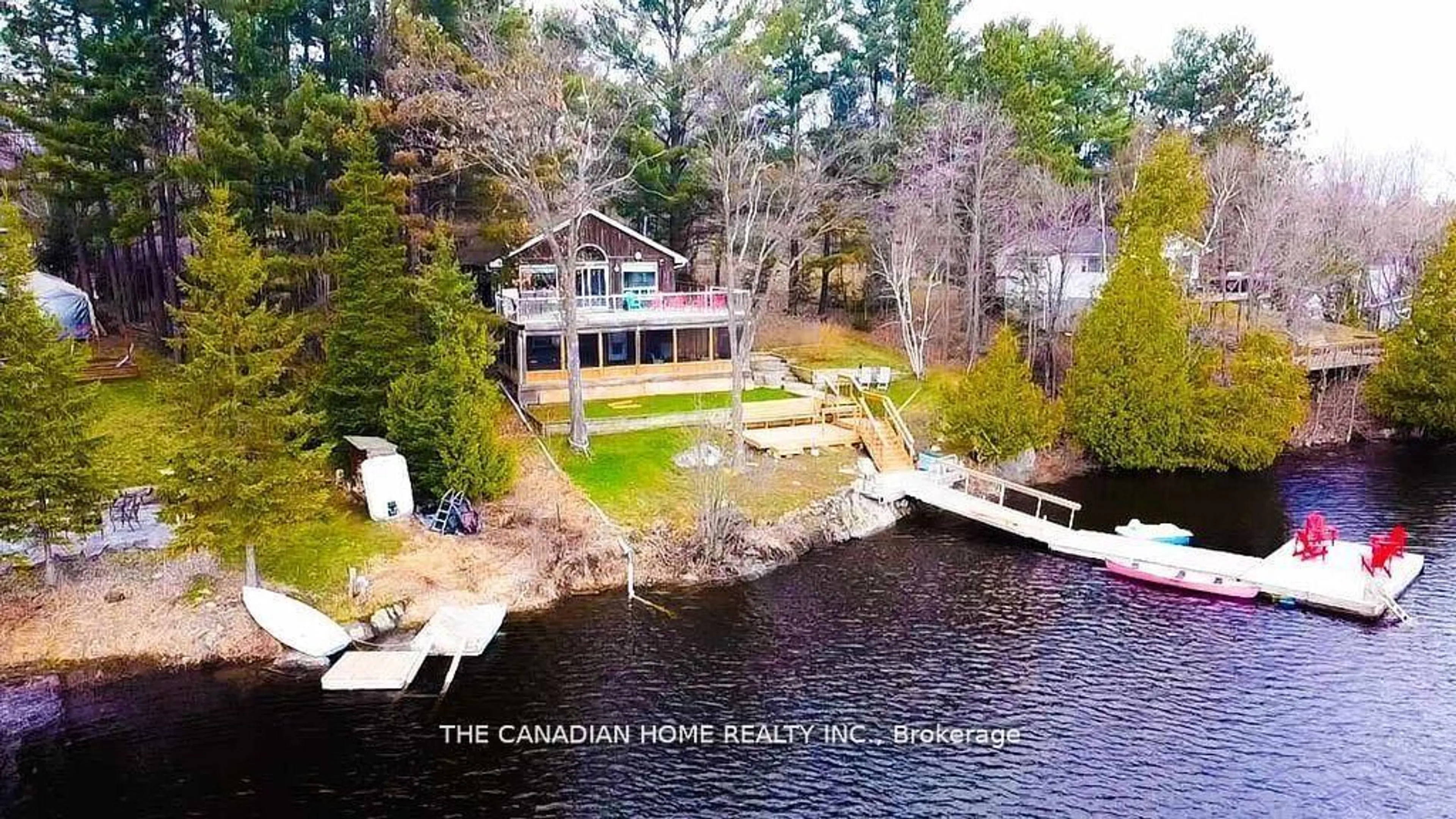 A pic from outside/outdoor area/front of a property/back of a property/a pic from drone, water/lake/river/ocean view for 92 Mckellar Lake Rd, McKellar Ontario P0G 1C0
