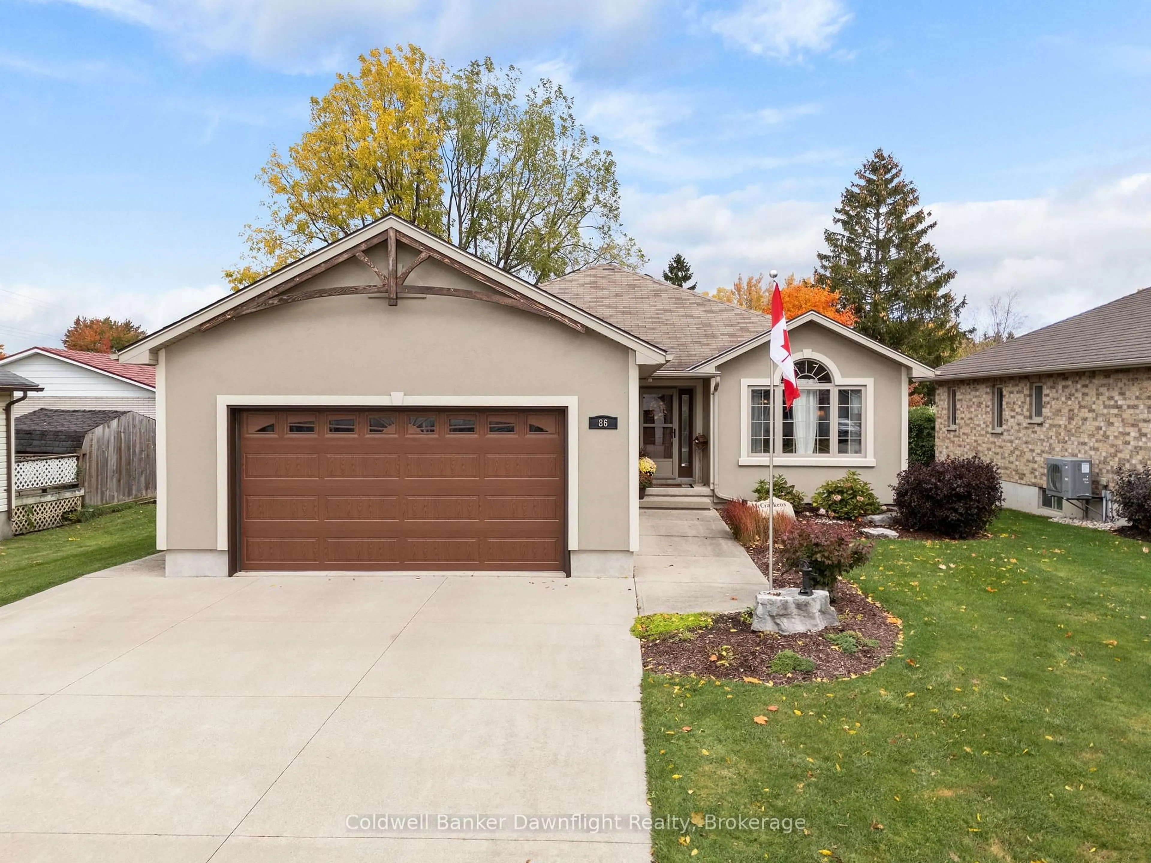 Home with vinyl exterior material, street for 86 Huron St, South Huron Ontario N0M 1S2