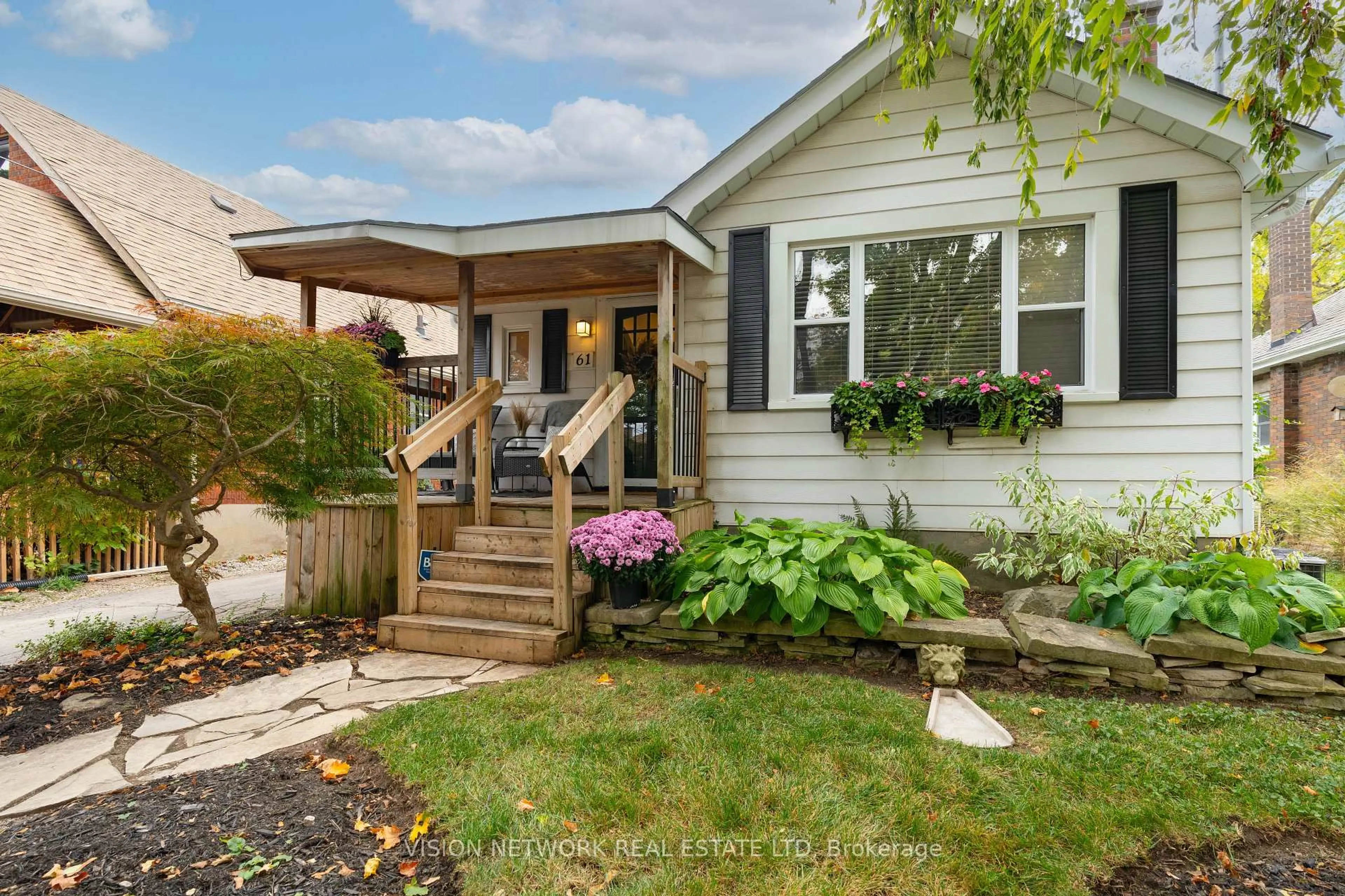 Home with vinyl exterior material, street for 61 Langarth St, London South Ontario N6C 1Y9