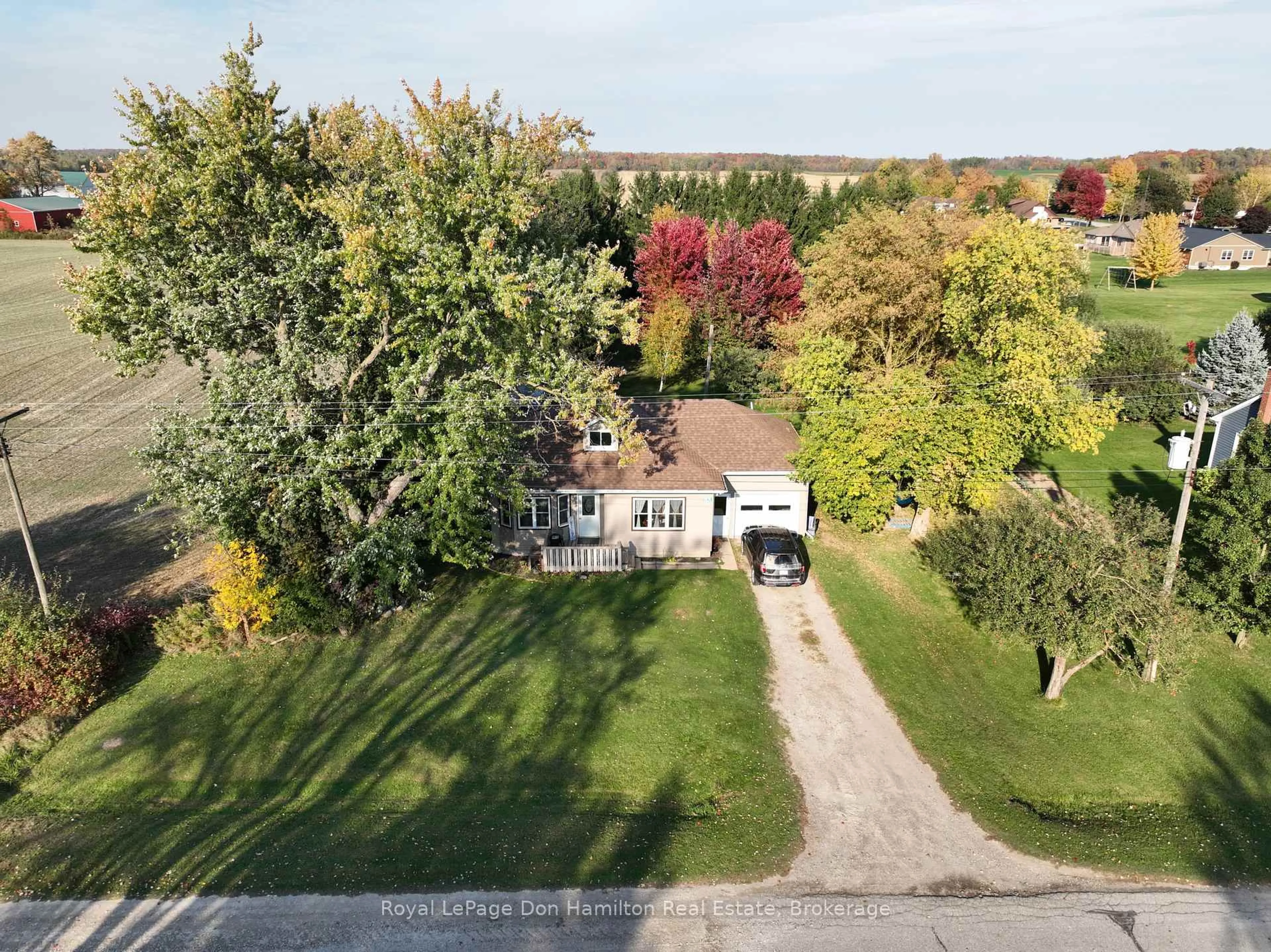 A pic from outside/outdoor area/front of a property/back of a property/a pic from drone, street for 5919 Road 119, Perth East Ontario N0K 1C0