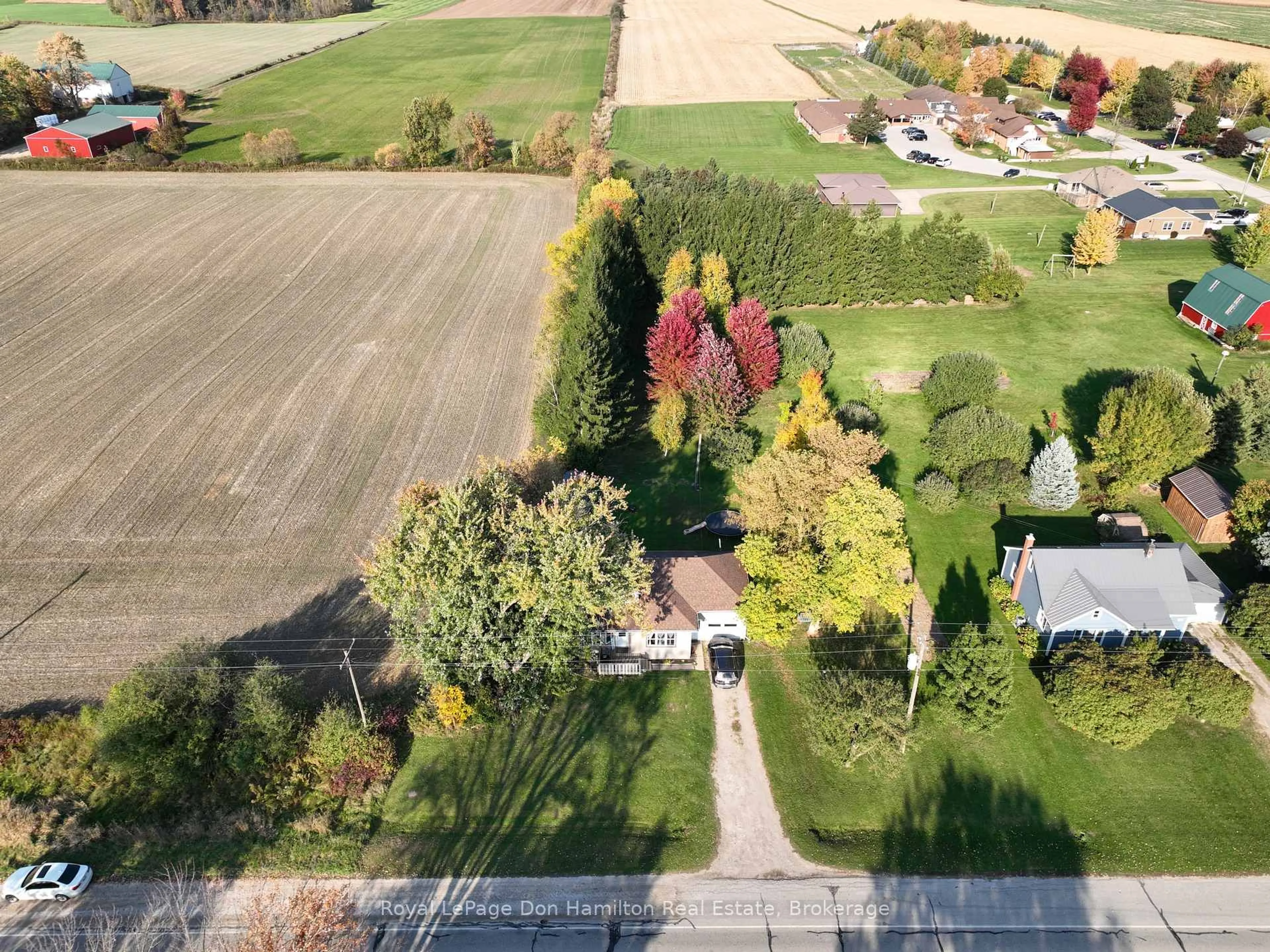 A pic from outside/outdoor area/front of a property/back of a property/a pic from drone, street for 5919 Road 119, Perth East Ontario N0K 1C0