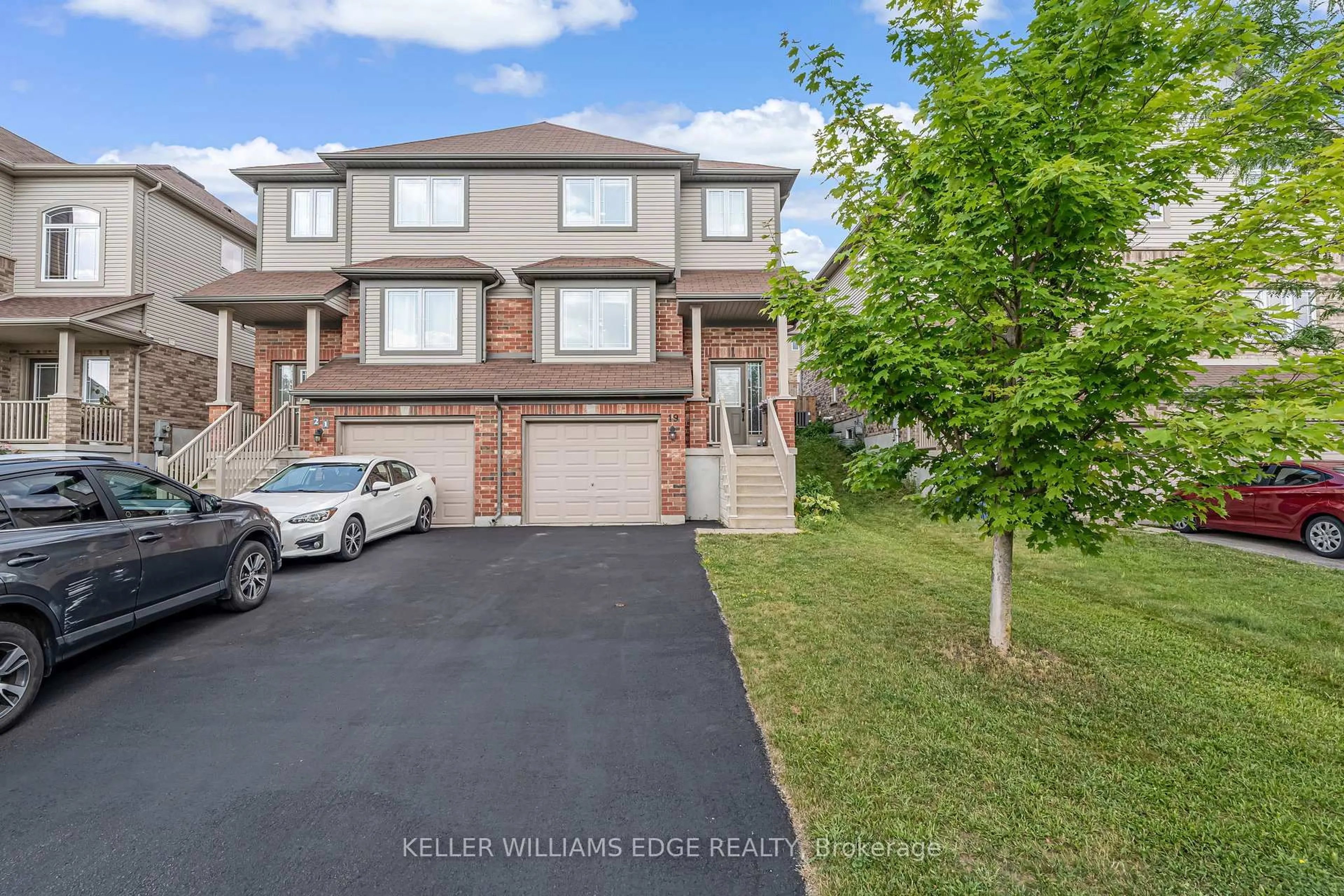 A pic from outside/outdoor area/front of a property/back of a property/a pic from drone, street for 19 Oakes Cres, Guelph Ontario N1E 0J6