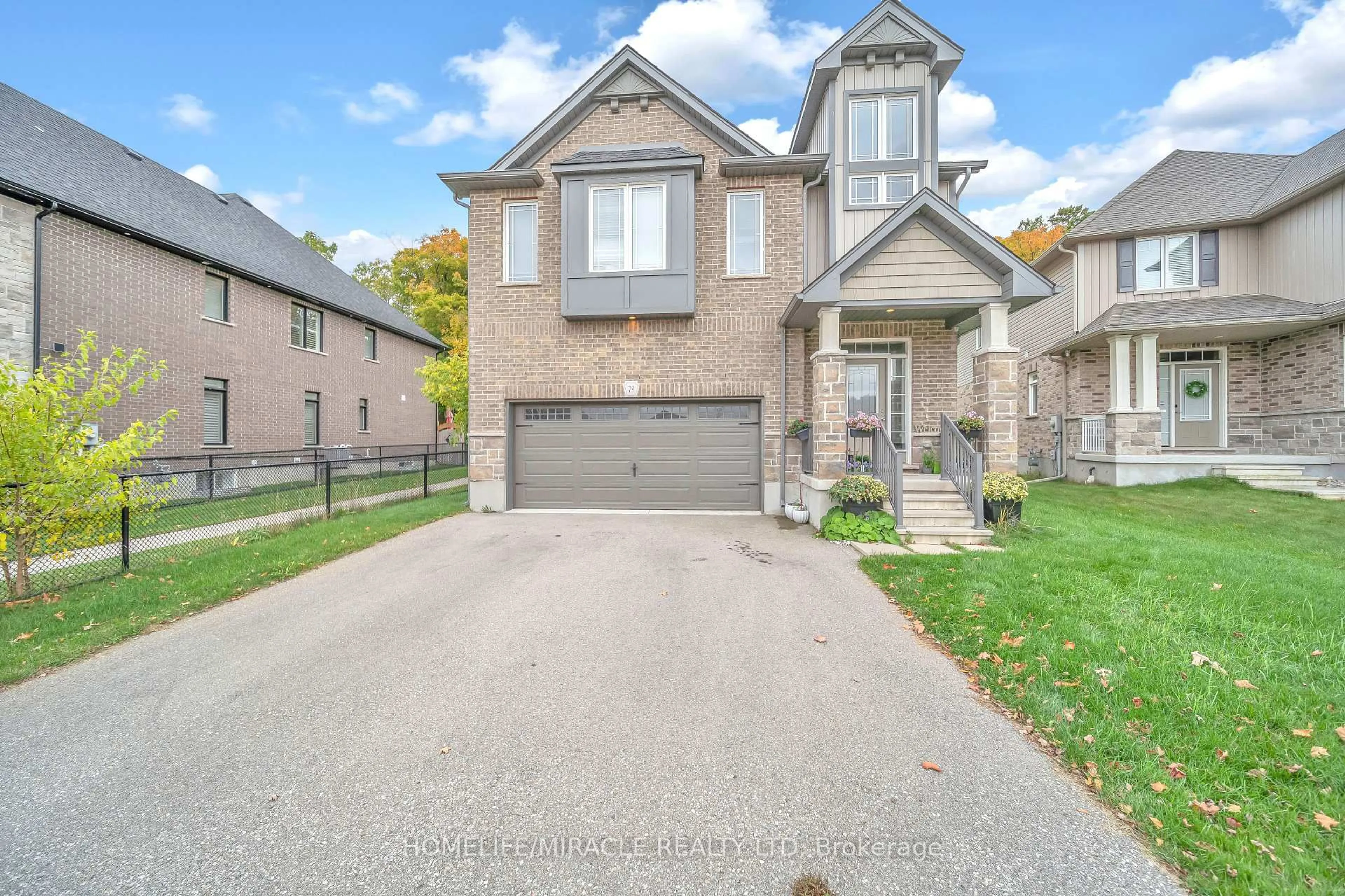 Home with brick exterior material, street for 79 Elmbank Tr, Kitchener Ontario N2R 0H1