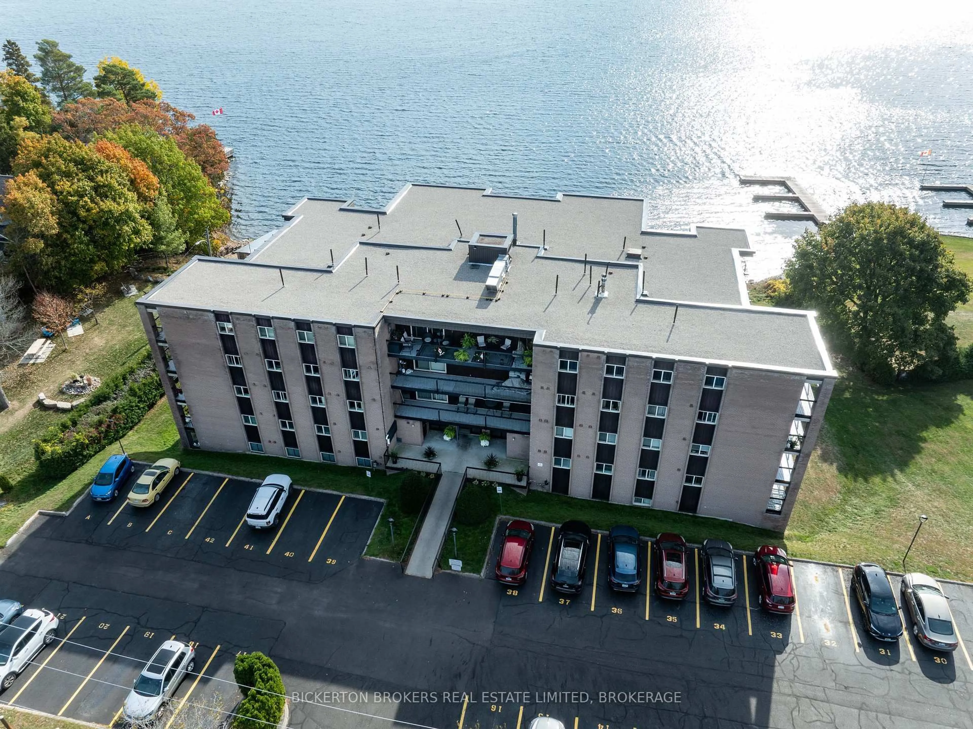 A pic from outside/outdoor area/front of a property/back of a property/a pic from drone, water/lake/river/ocean view for 610 William St #406, Gananoque Ontario K7G 3A4