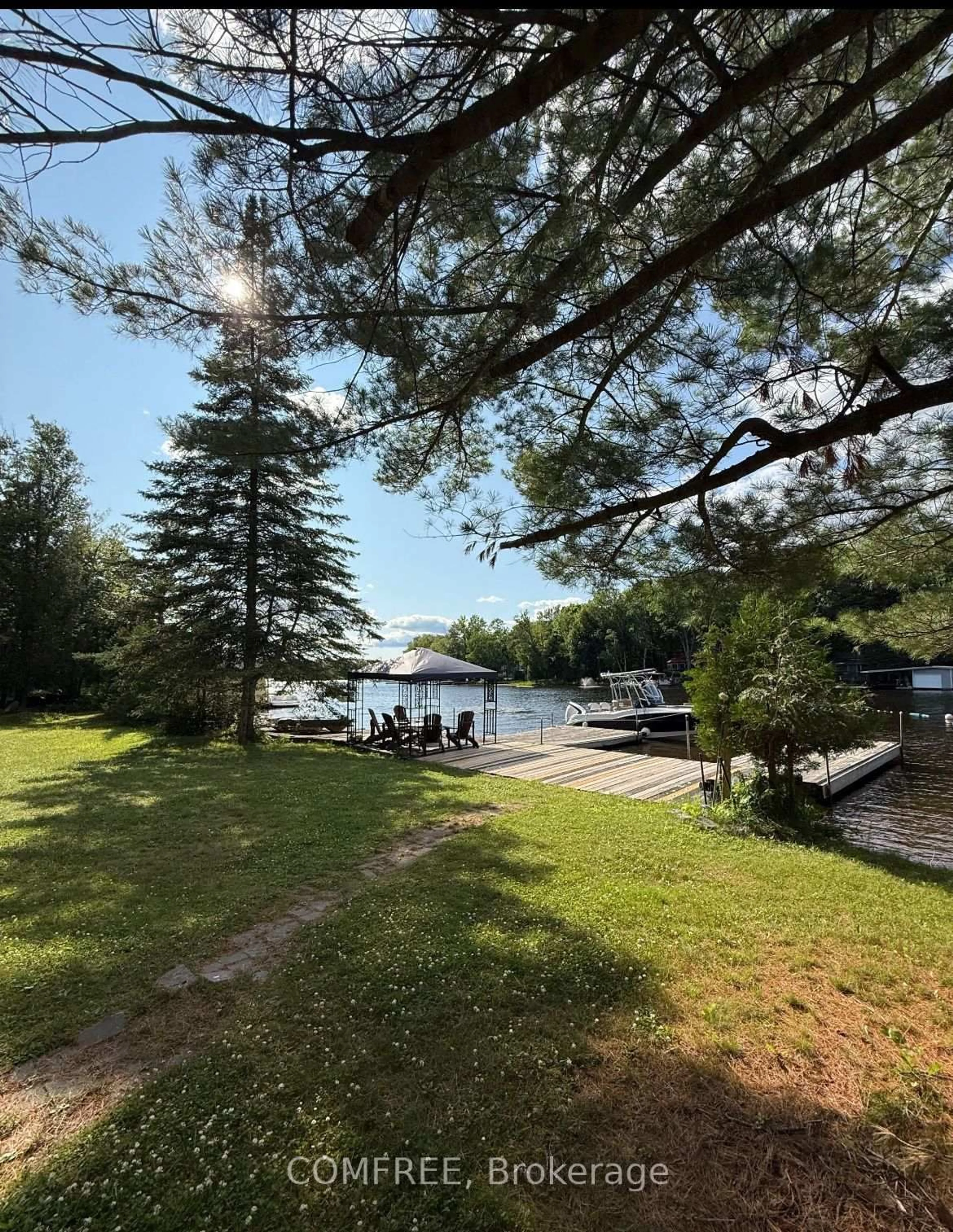 A pic from outside/outdoor area/front of a property/back of a property/a pic from drone, water/lake/river/ocean view for 30 Mcvittle Island, Bracebridge Ontario P1L 1W8