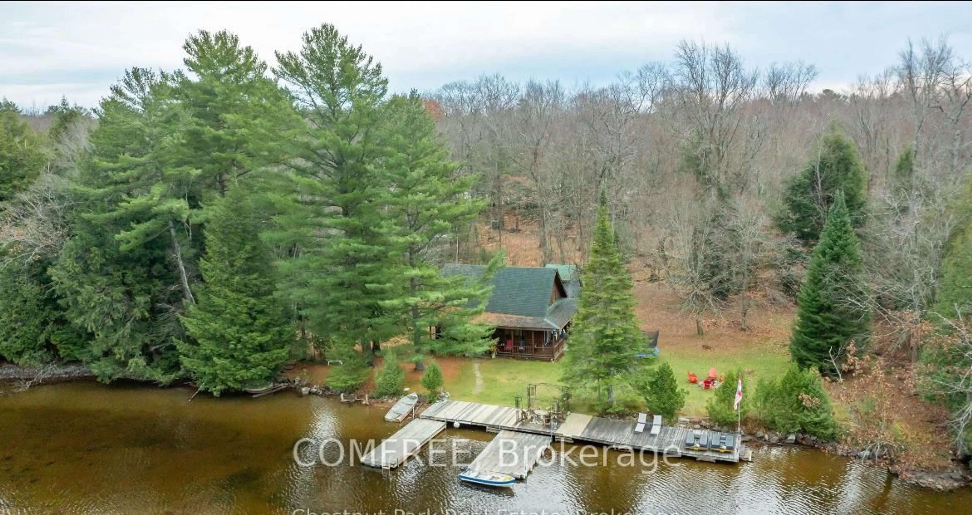 A pic from outside/outdoor area/front of a property/back of a property/a pic from drone, water/lake/river/ocean view for 30 Mcvittle Island, Bracebridge Ontario P1L 1W8
