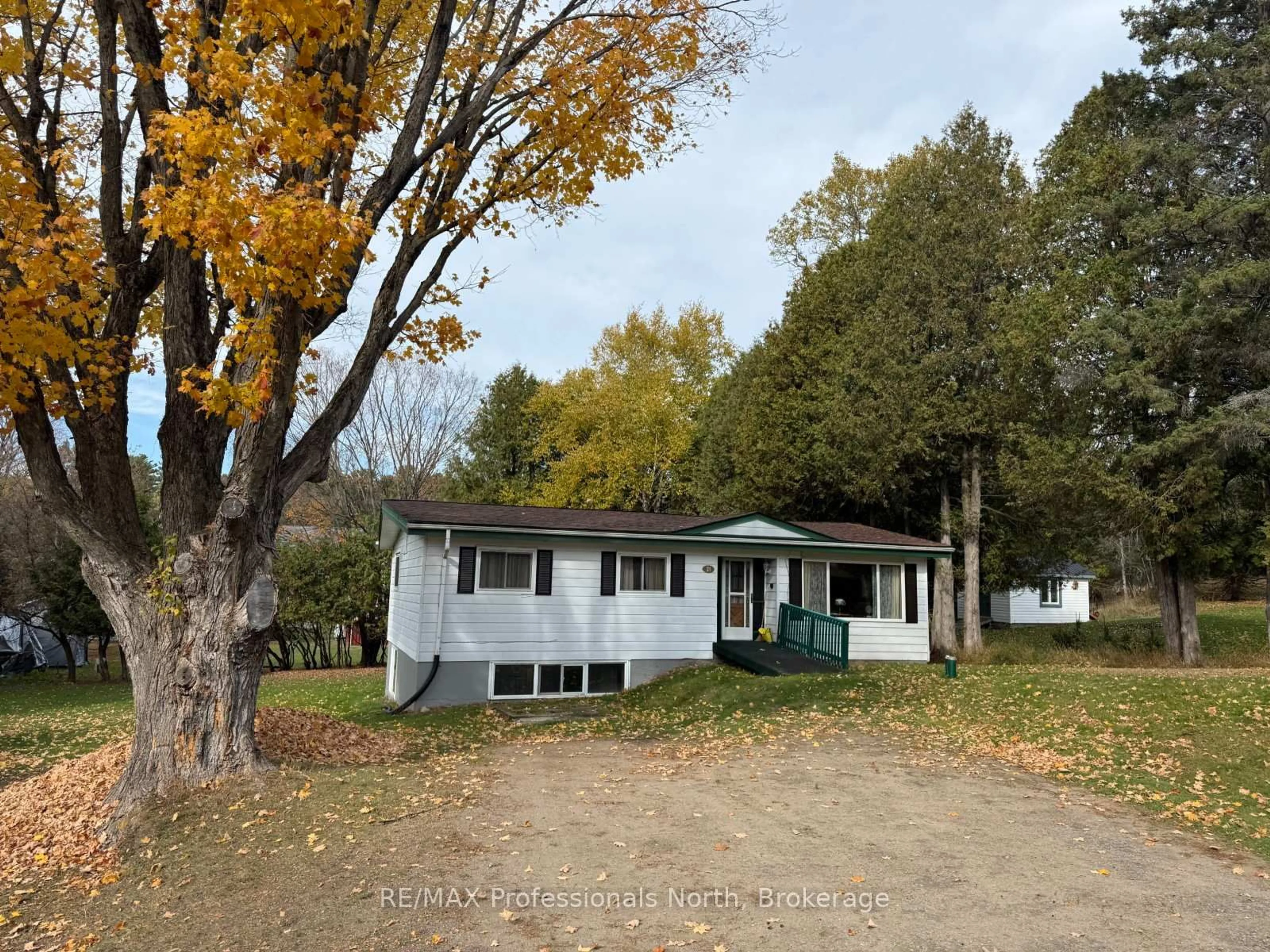 A pic from outside/outdoor area/front of a property/back of a property/a pic from drone, street for 21 George St, Dysart et al Ontario K0M 1S0