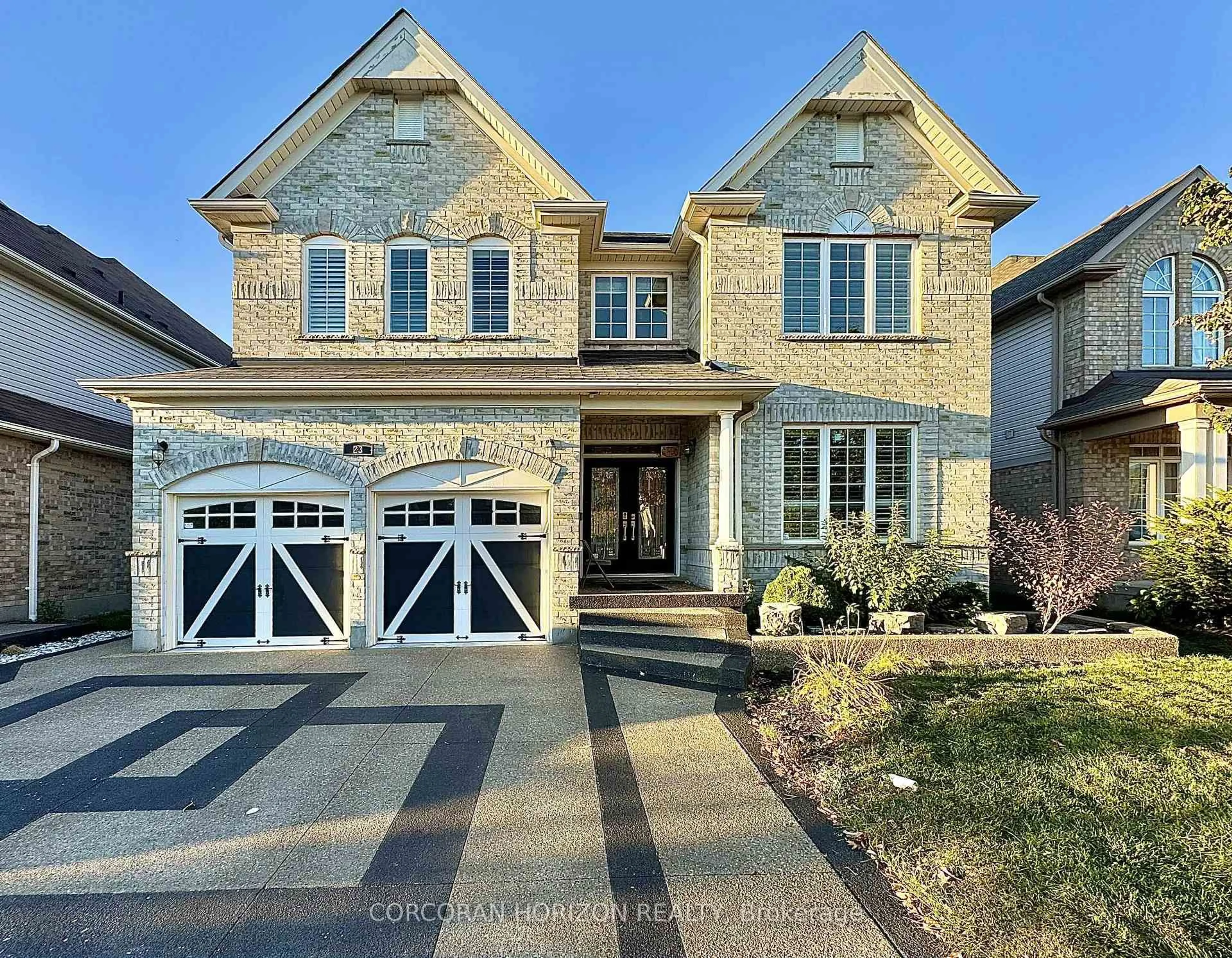 Home with brick exterior material, street for 23 Mossgrove Dr #Lower, Cambridge Ontario N2P 2Y8
