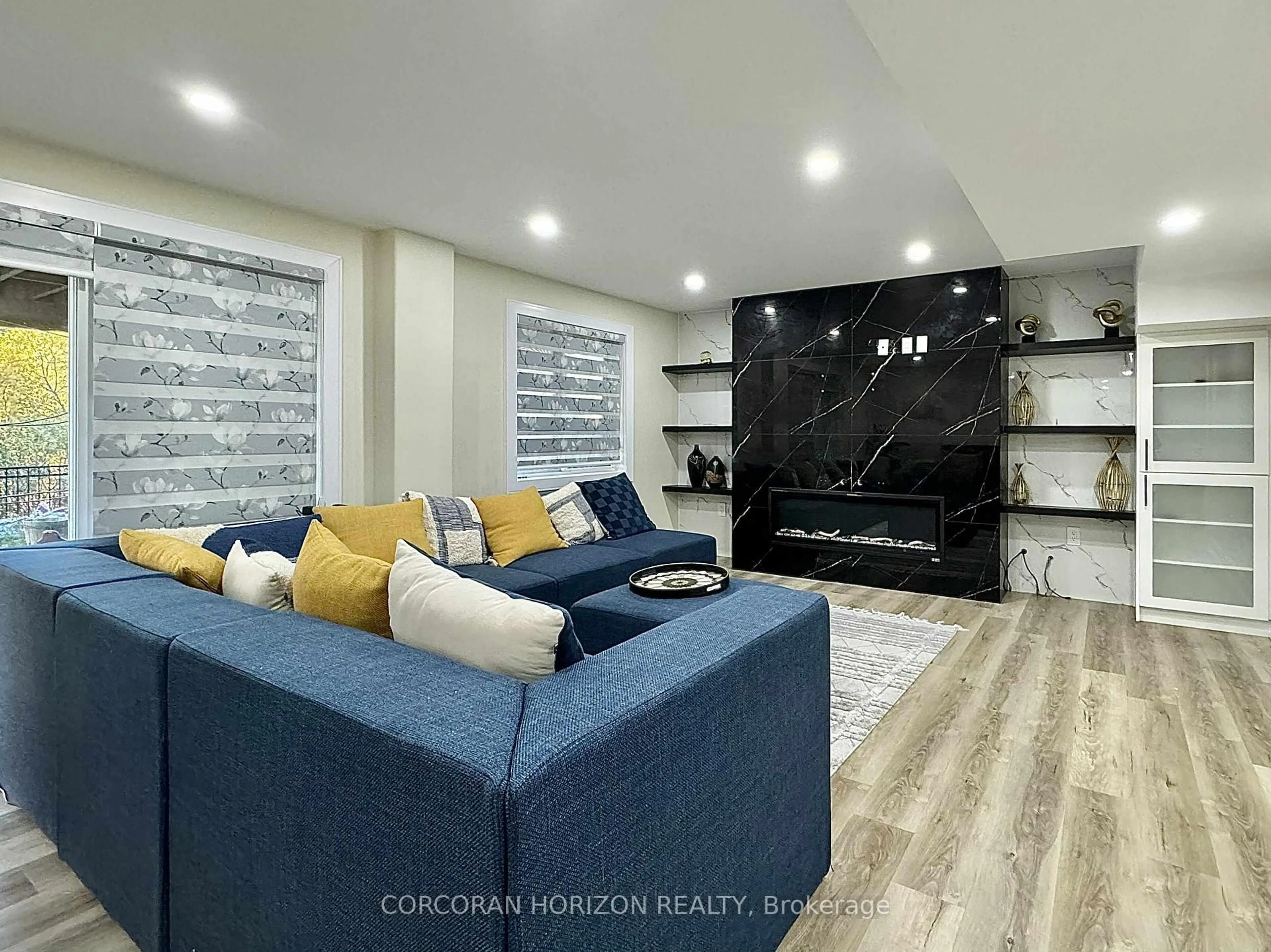 Living room with furniture, ceramic/tile floor for 23 Mossgrove Dr #Lower, Cambridge Ontario N2P 2Y8