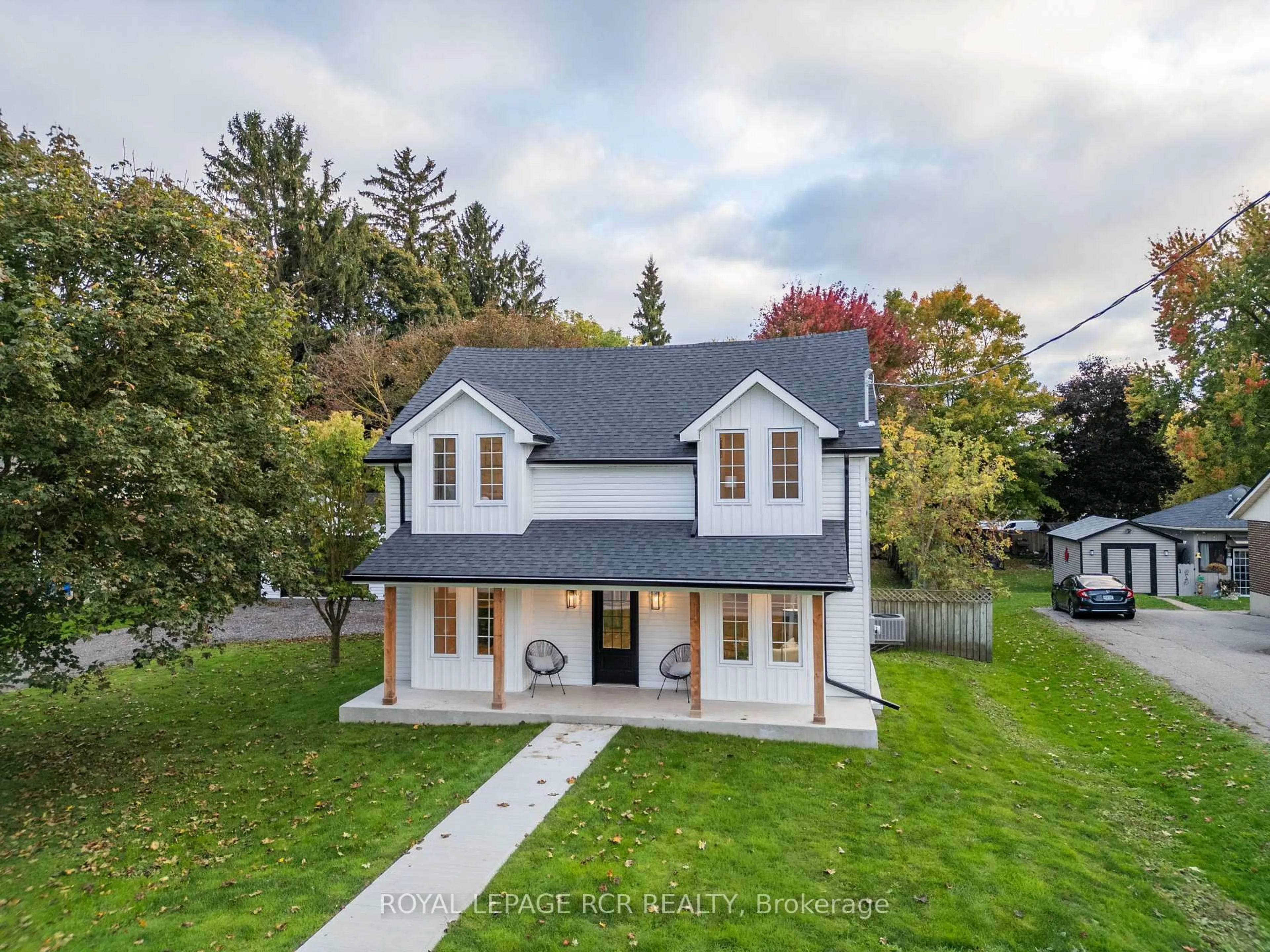 A pic from outside/outdoor area/front of a property/back of a property/a pic from drone, street for 349 Smith St, Wellington North Ontario N0G 1A0