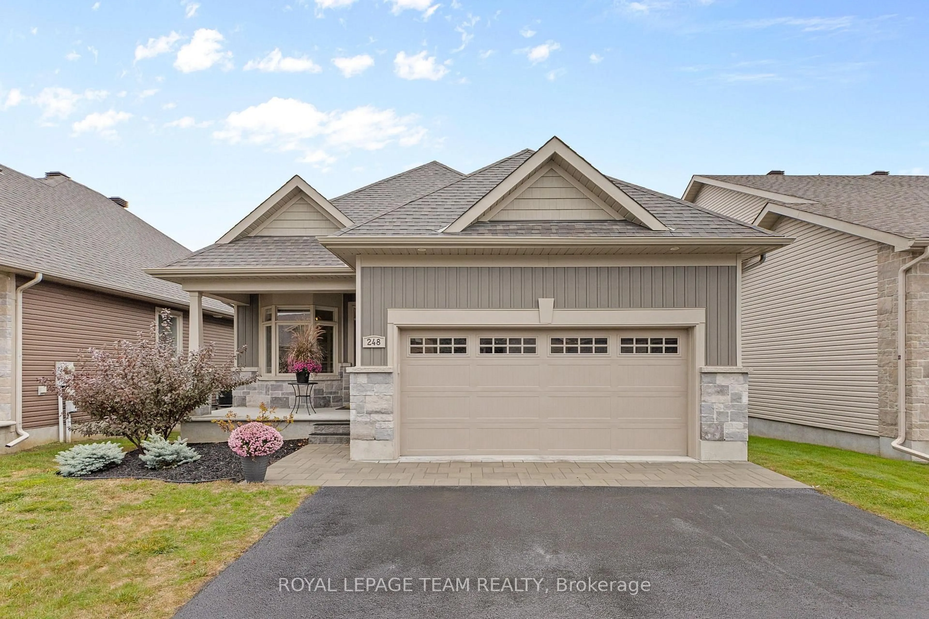 Home with vinyl exterior material, street for 248 Shinny Ave, Ottawa Ontario K2V 0B9