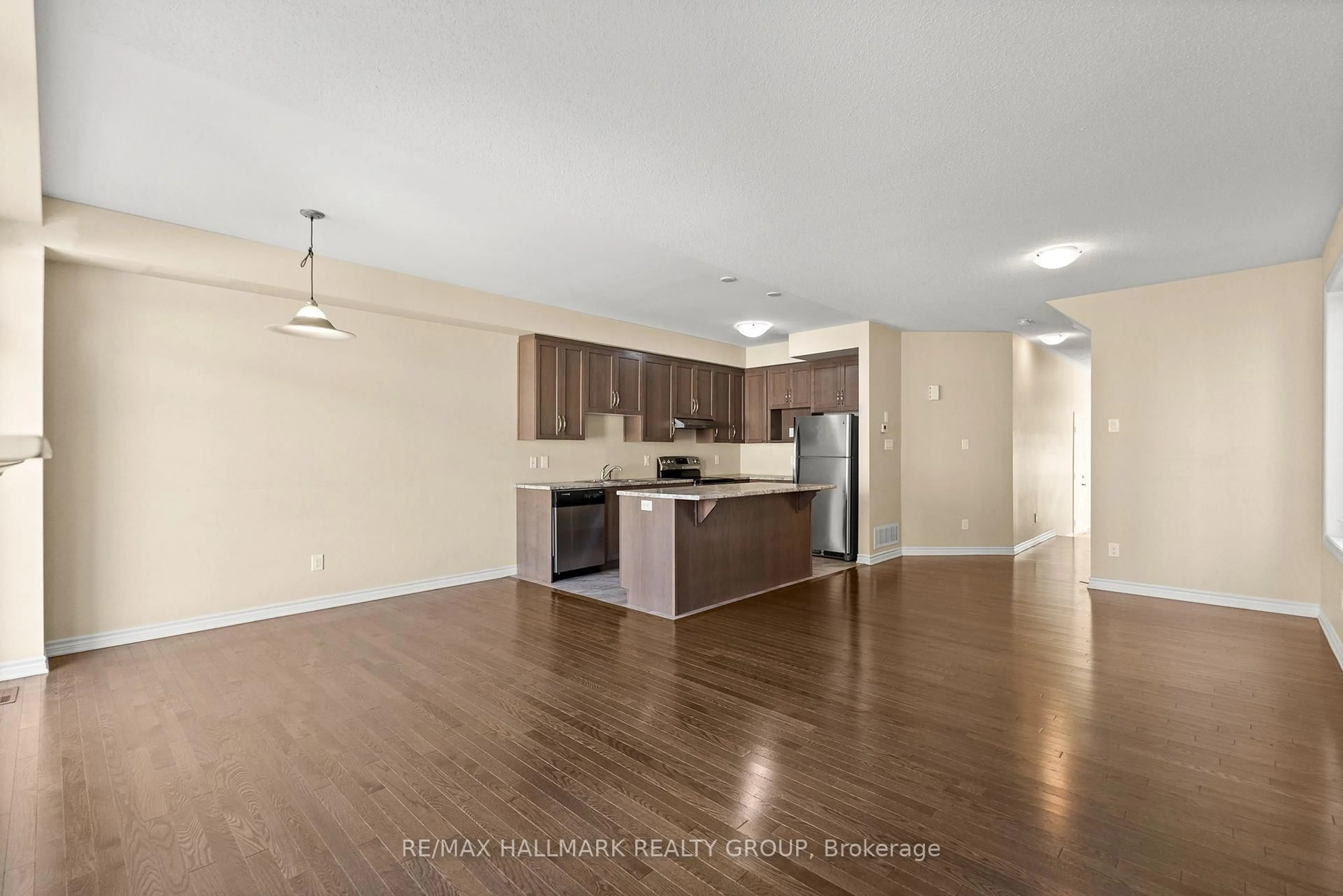 Open concept kitchen, wood/laminate floor for 562 Via Mattino Way, Nepean Ontario K2J 6B8