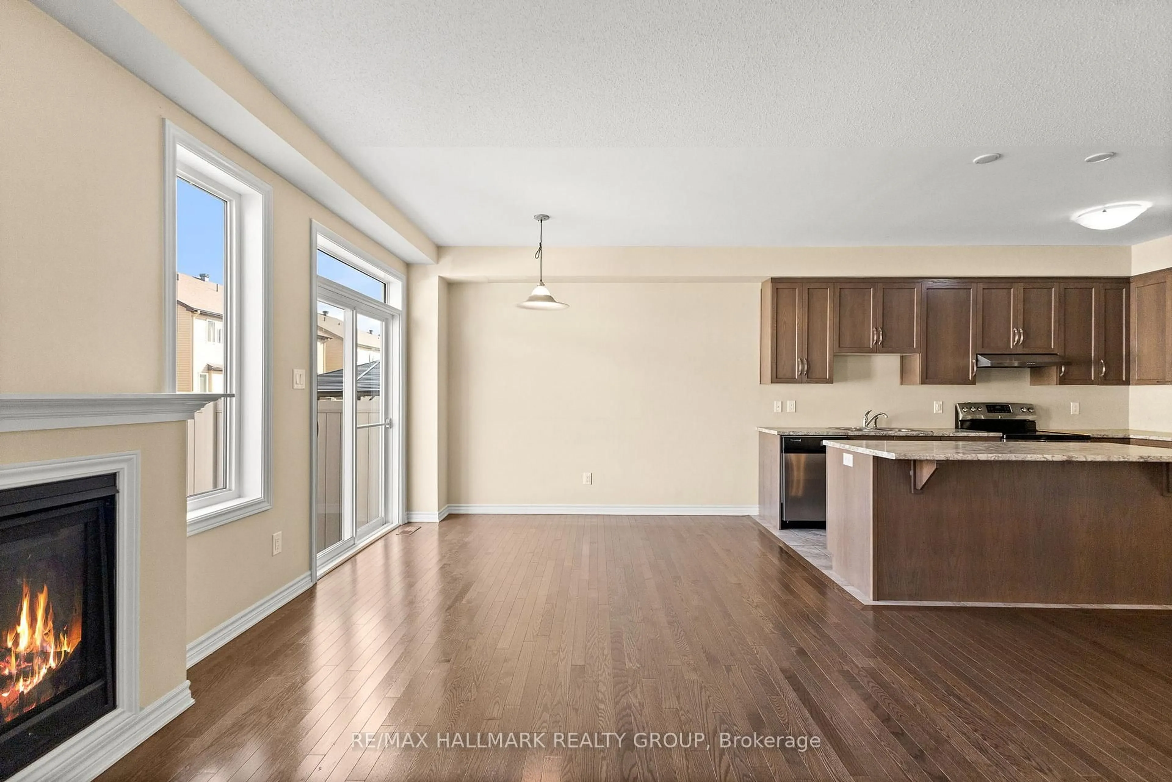 Open concept kitchen, wood/laminate floor for 562 Via Mattino Way, Nepean Ontario K2J 6B8